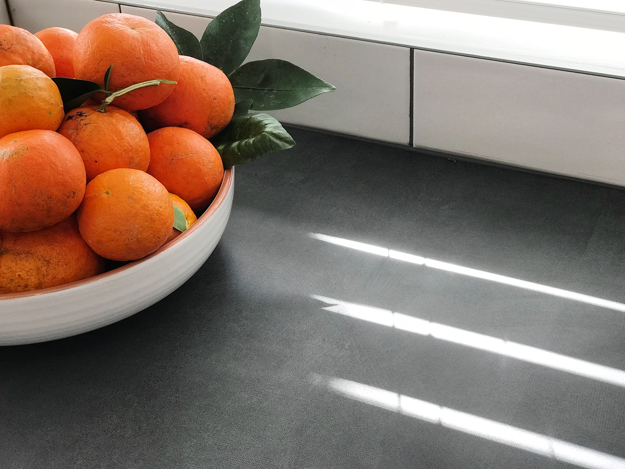 Pearson + Project The Rookies Kitchen Reveal Benchtop Oranges Tiles Urban.jpg