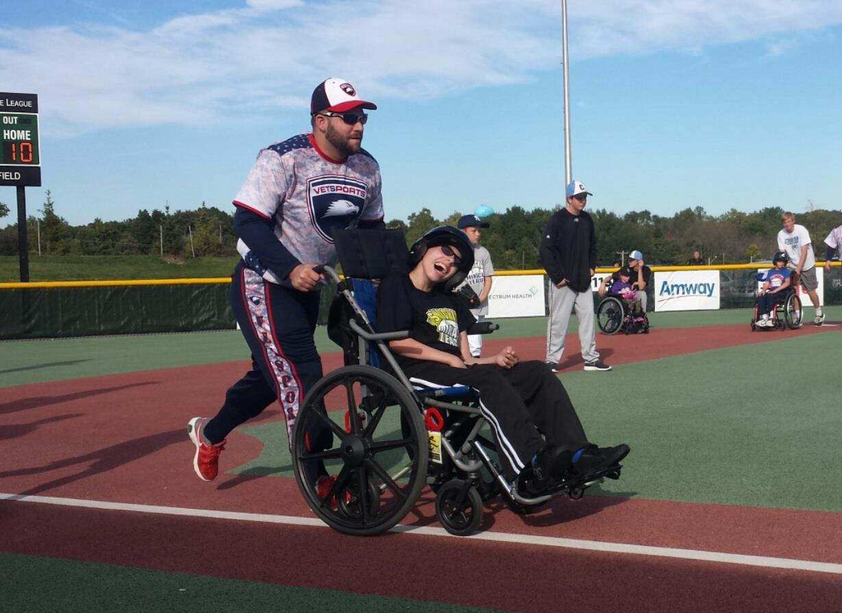 Chris participating in the VETSports and West Michigan Miracle League event in Grand Rapids, MI. Chris has been a leader, volunteer, and member of VETSports since 2012.