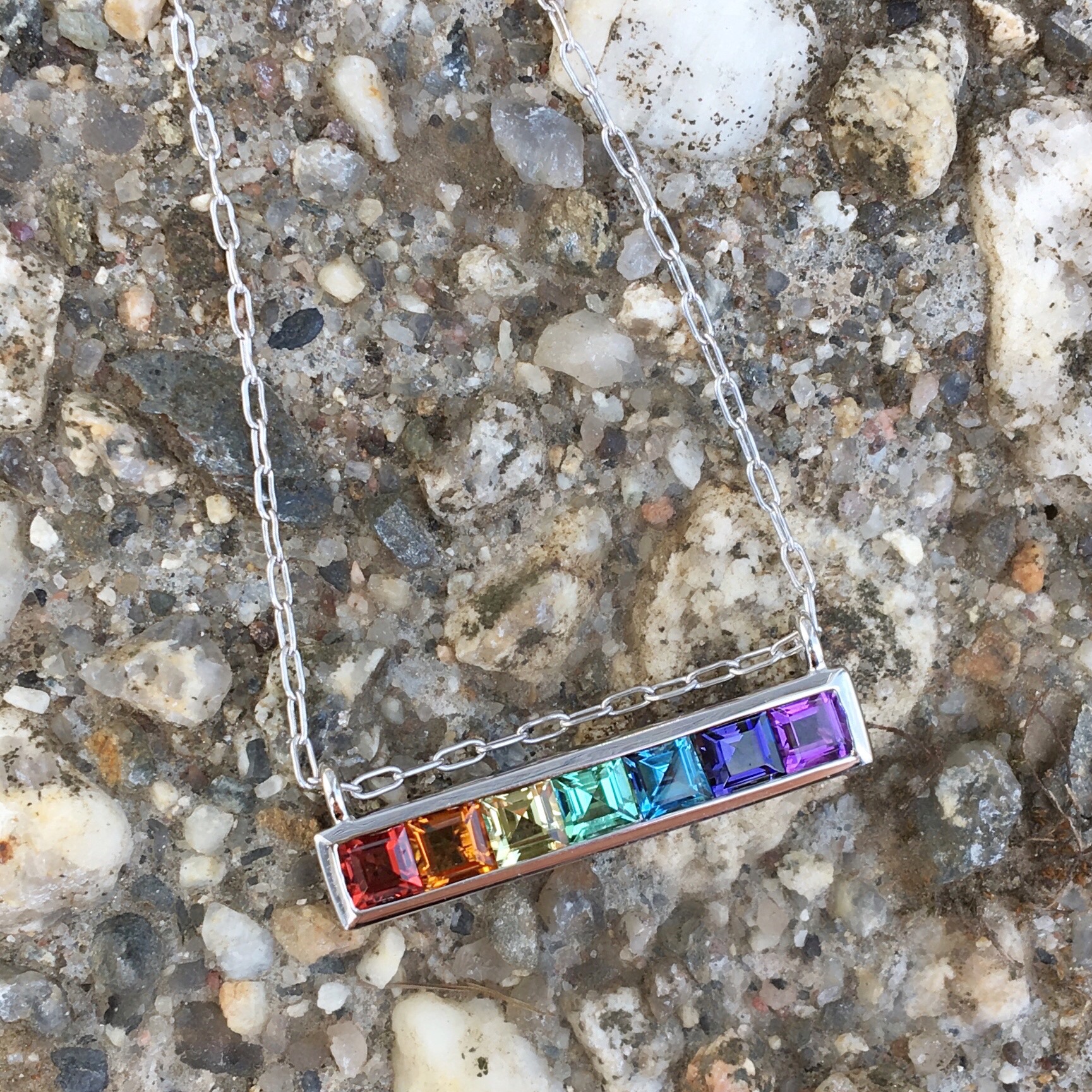 Jane Taylor Jewelry - Cirque Horizontal Bar Necklace in 14K Yellow Gold with Square Rainbow Gemstones.