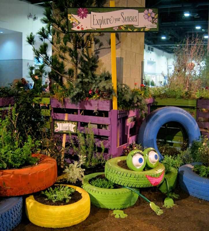 Recycled tires become whimsical planters…