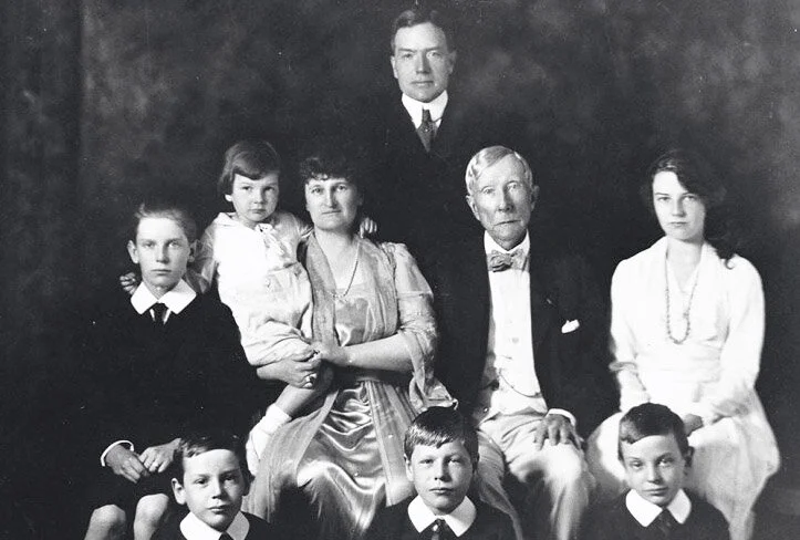 John D. Rockefeller with his family. John D. junior is standing in the back.