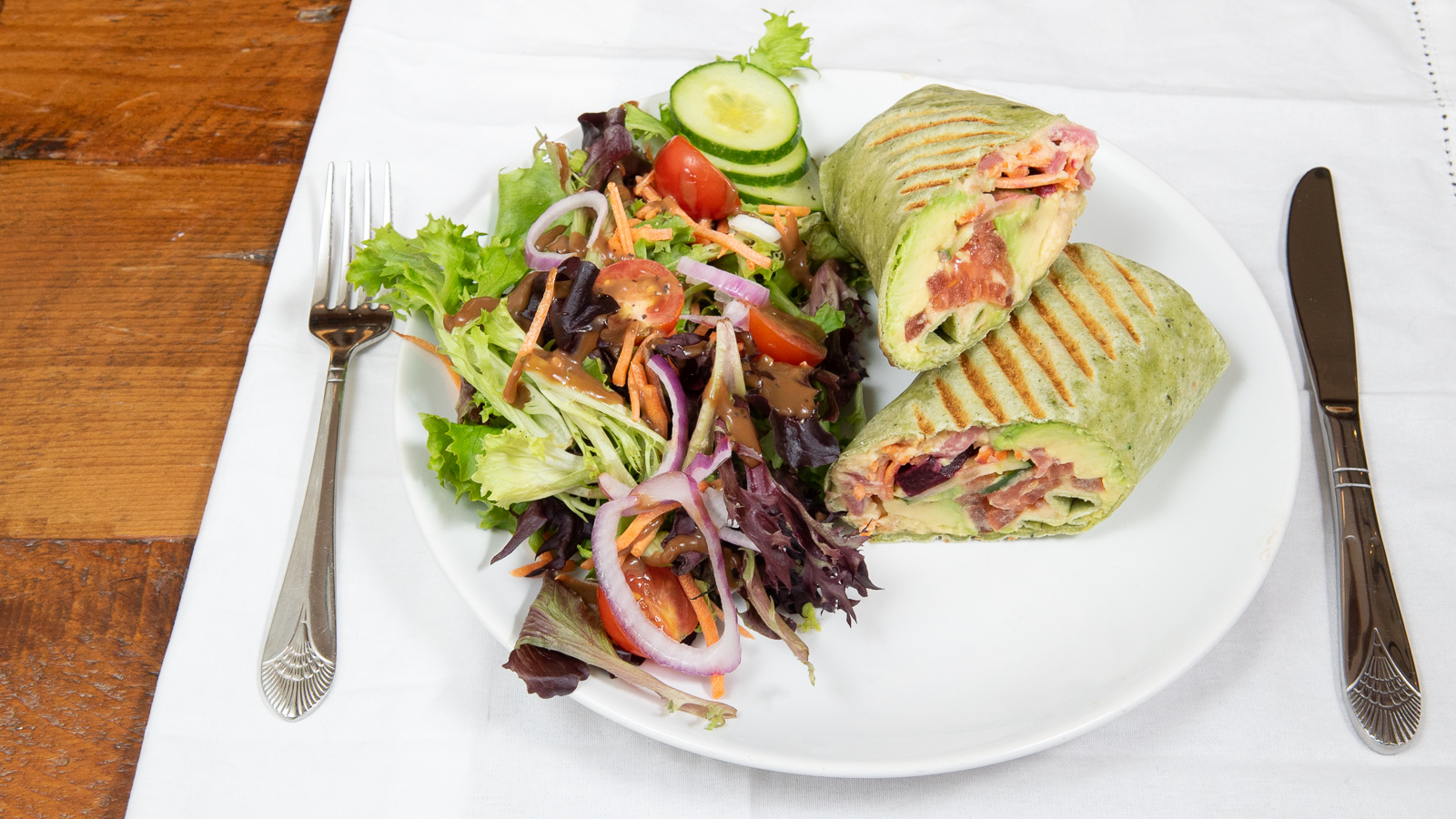 RAINBOW VEGGIE WRAP ON SPINACH.jpg