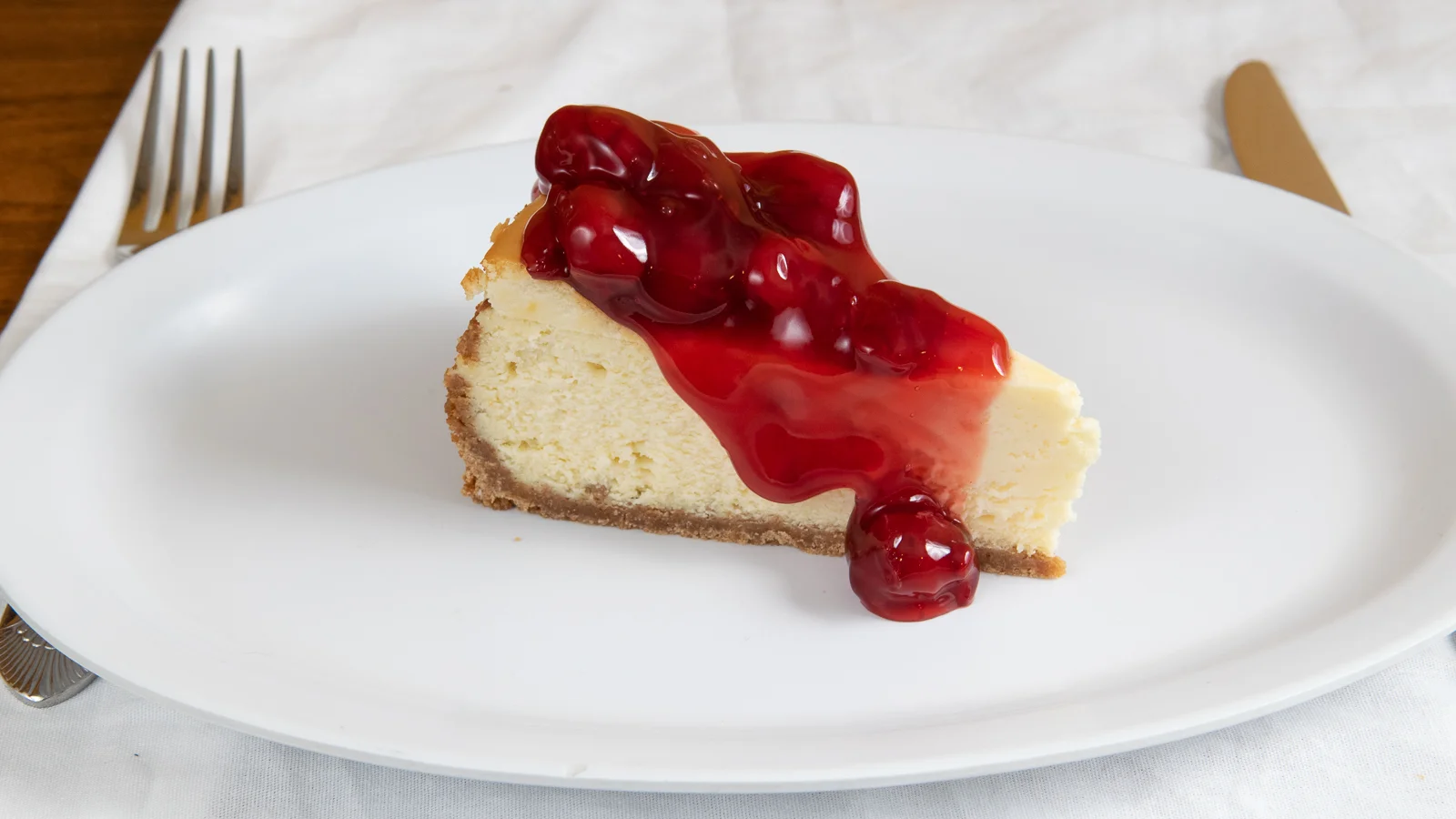 CHEESECAKE WITH CHERRY TOPPING.jpg