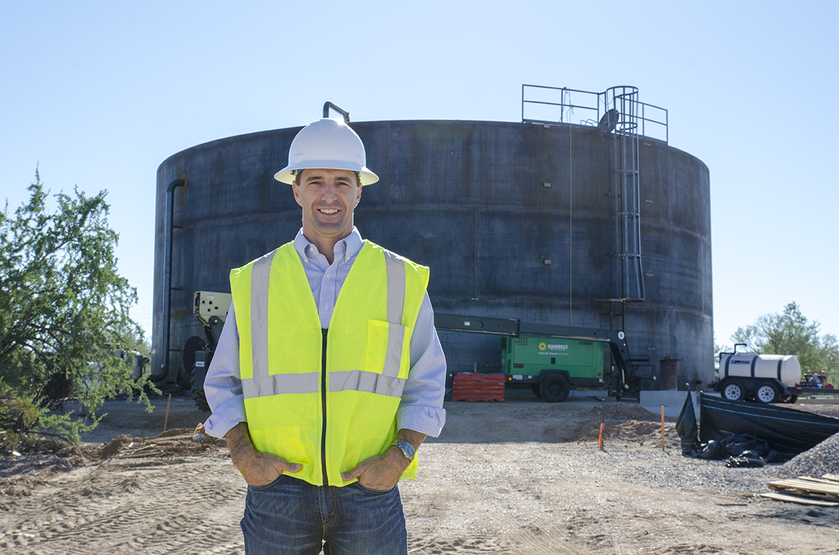 Assistant Water Director, Scott Schladweiler, on a construction site on Tangerine Rd.