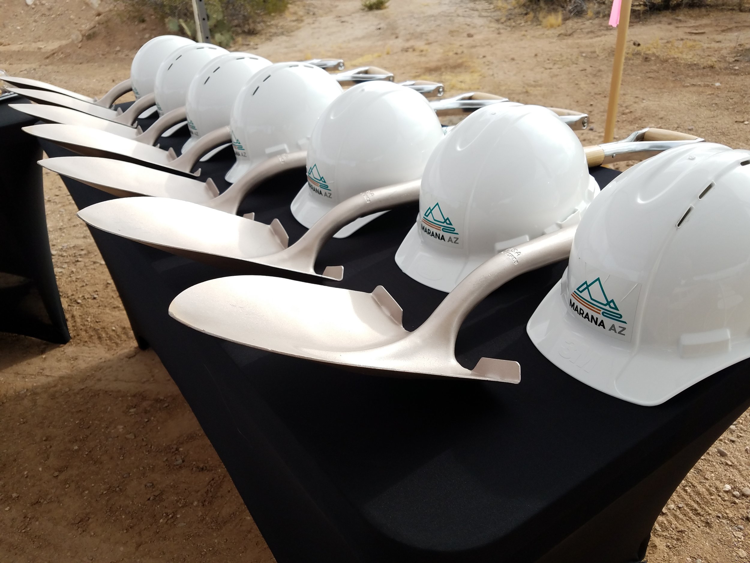 Ceremonial shovels and hard hats
