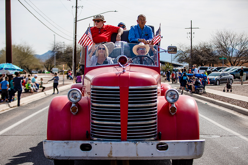  Mayor and Council ride on a vintage firetruck.  
