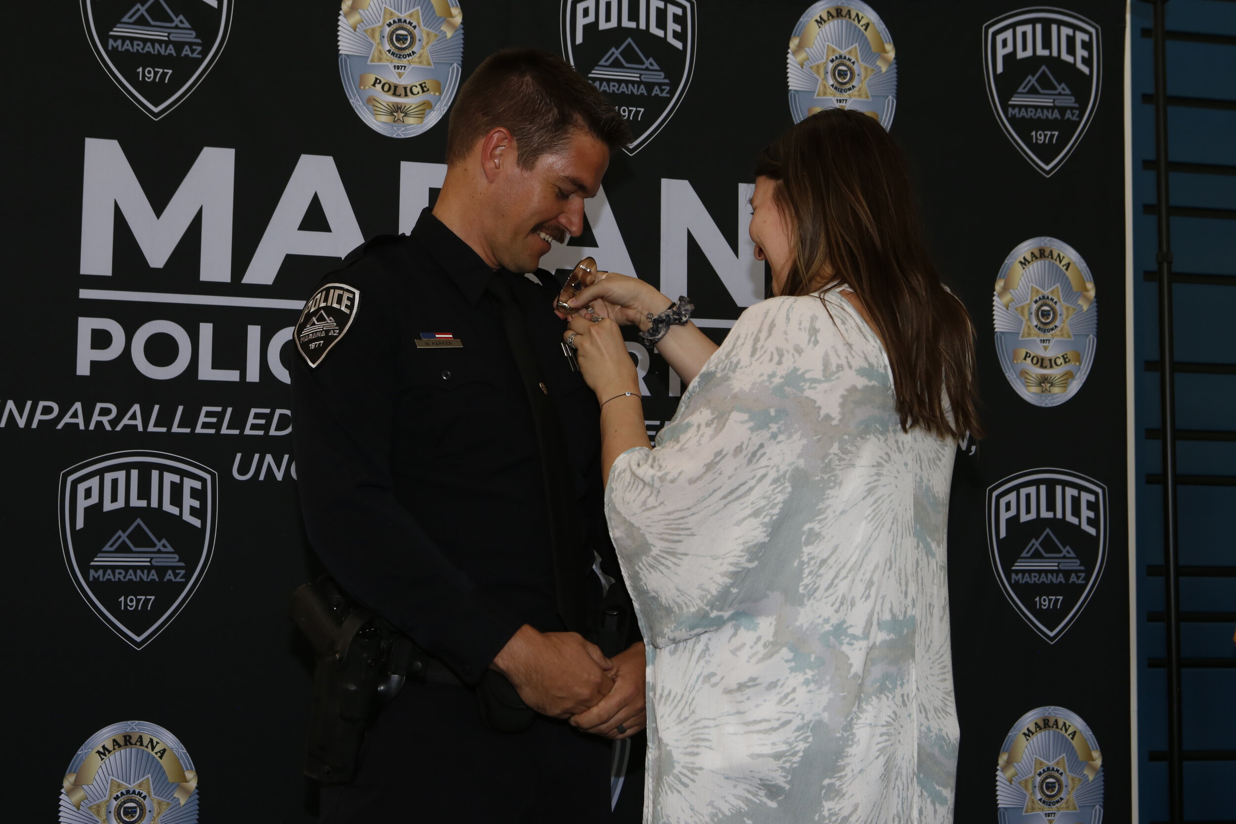  Officer Nicklaus Parker badge pinning 