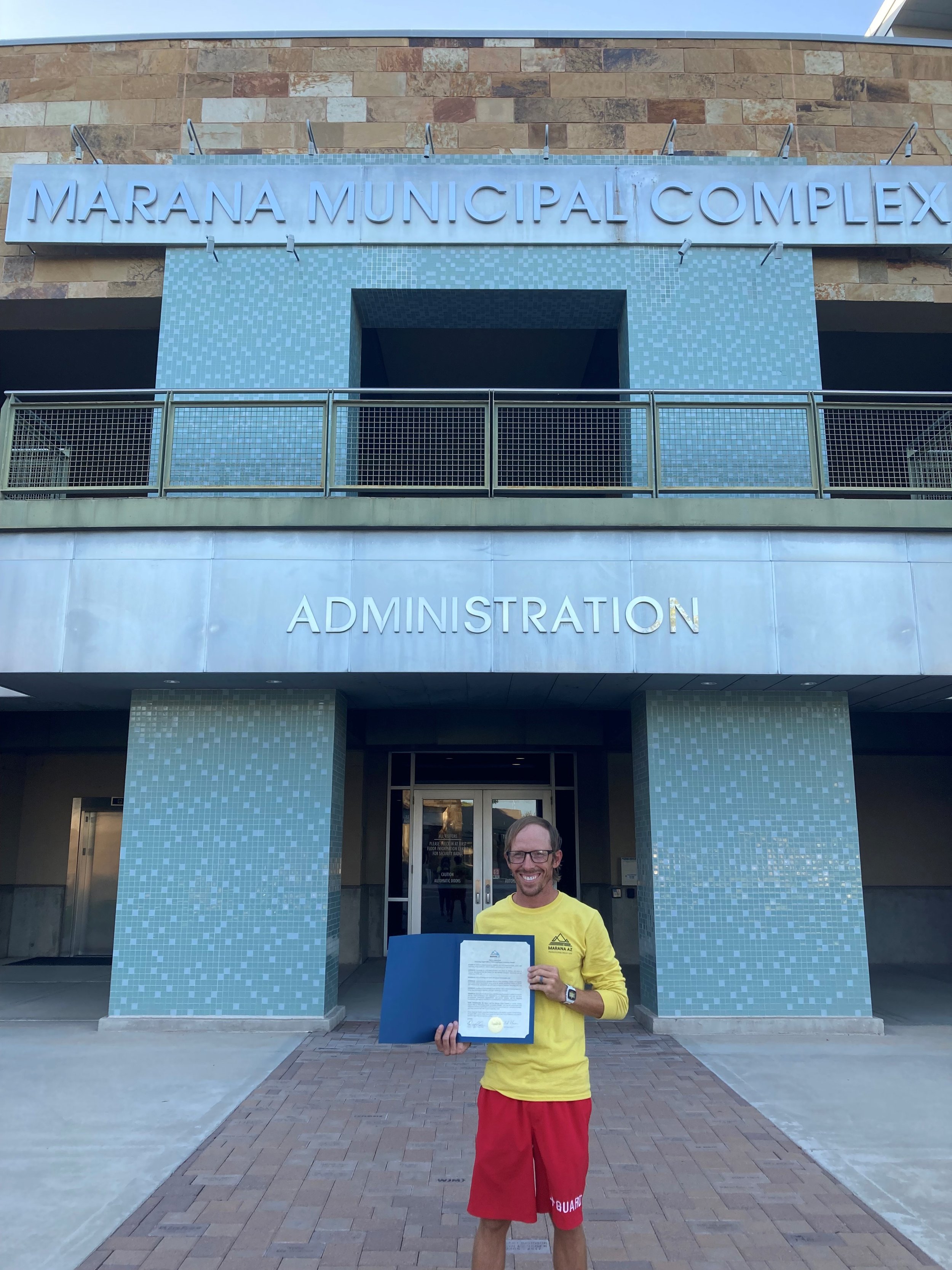  Marana Parks and Recreation Supervisor Kevin Goodrich with the August Drowning Impact Awareness Month Proclamation 
