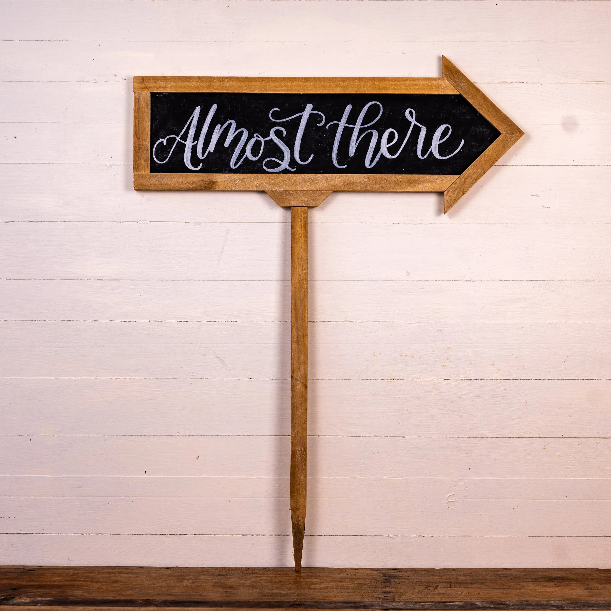 BLACK WOODEN CHALK "ALMOST THERE" ARROW / 23.5" W x 30" H / Qty in Stock: 2 / $ 8