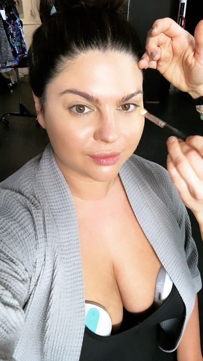 Using Willow pump in the makeup chair at a photo shoot. This would not be possible with a traditional pump!