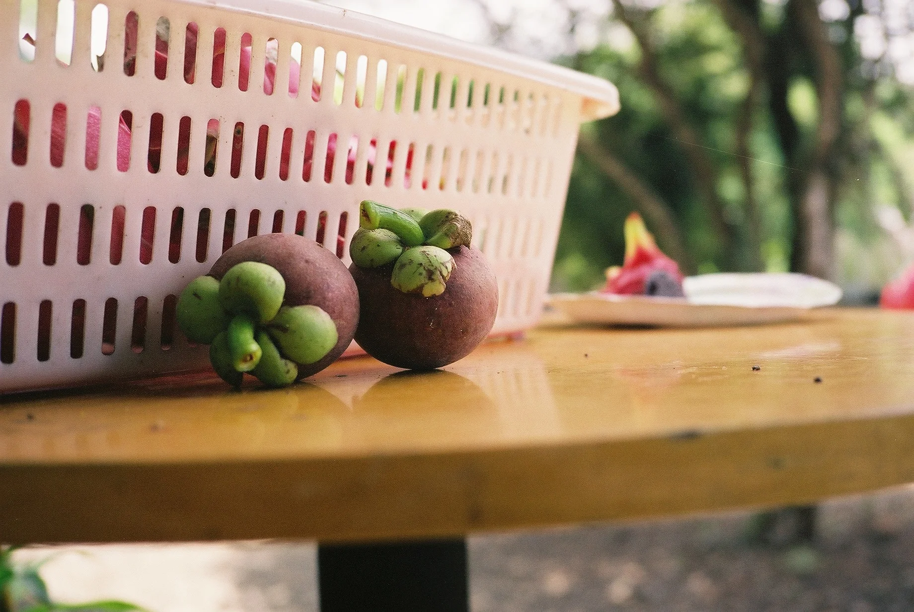 Mangosteen on table.