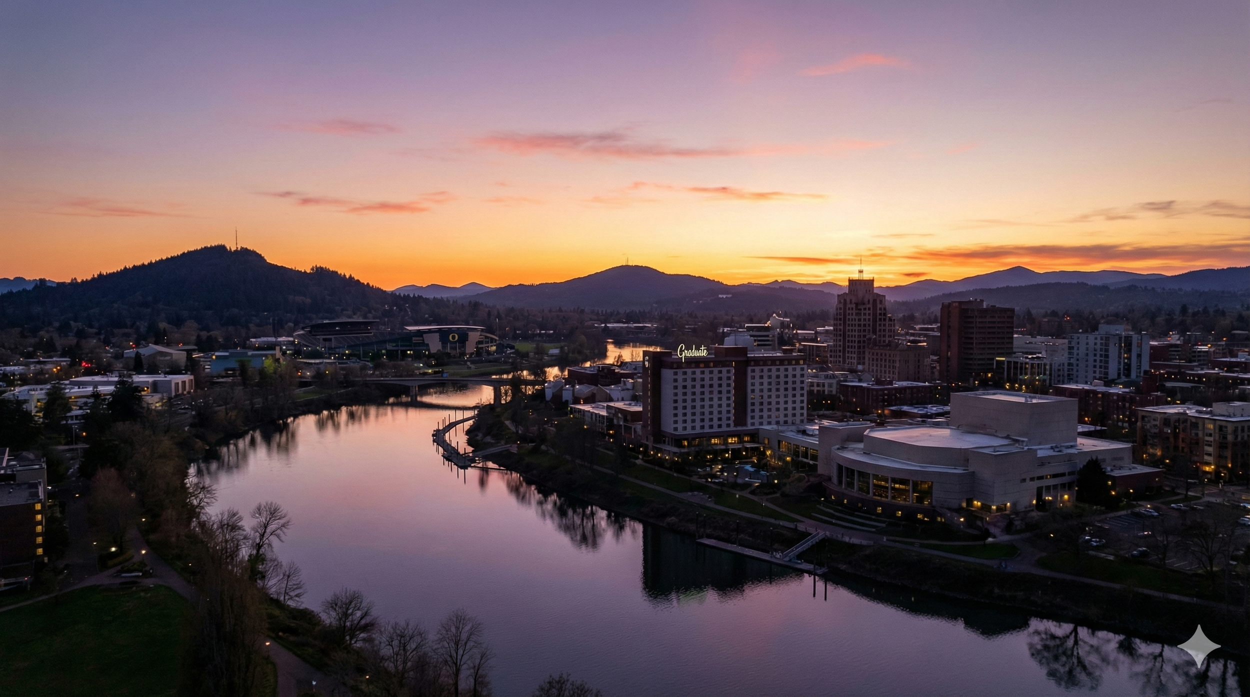 eugene-or-sunset-cityscape-willamette-river-skinner-butte-graduate-hotel.jpg