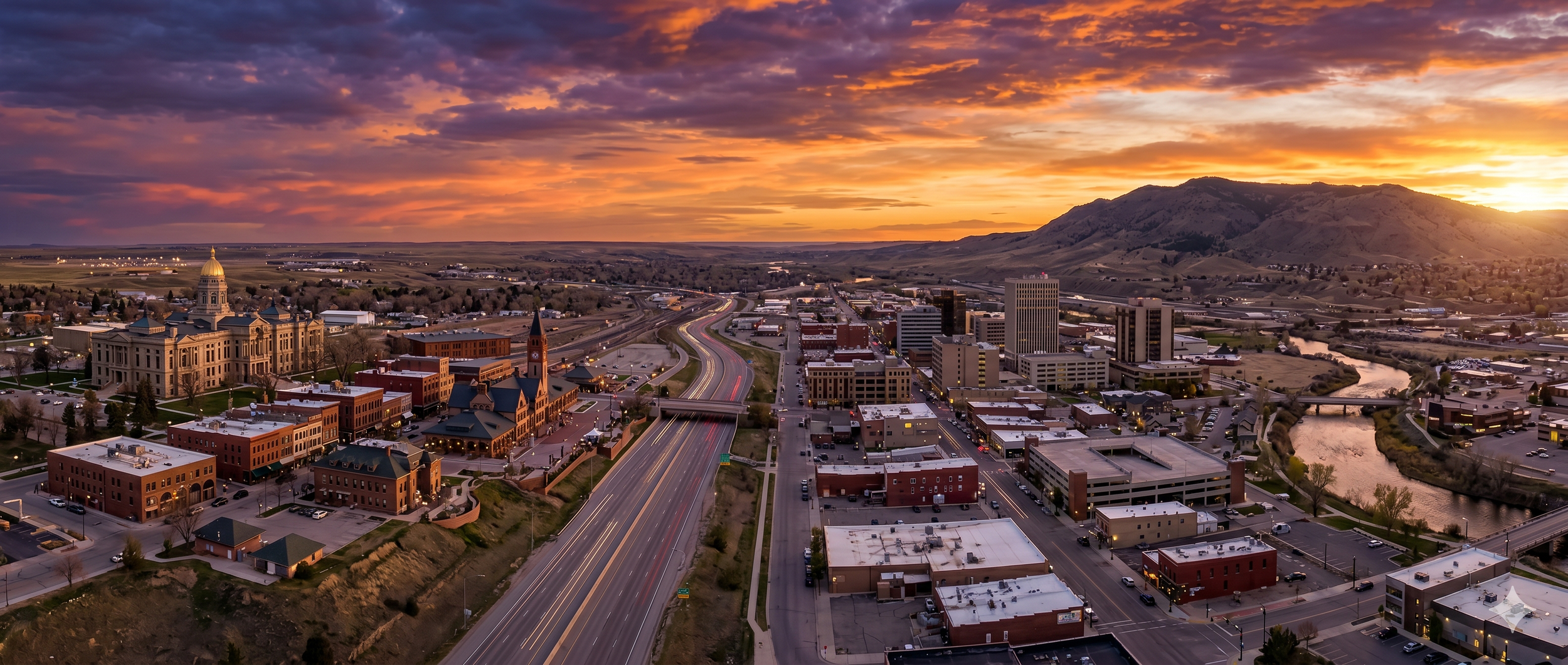 cheyenne-wyoming-capitol-and-casper-mountain-sunset-panoramic-cityscape-banner.png