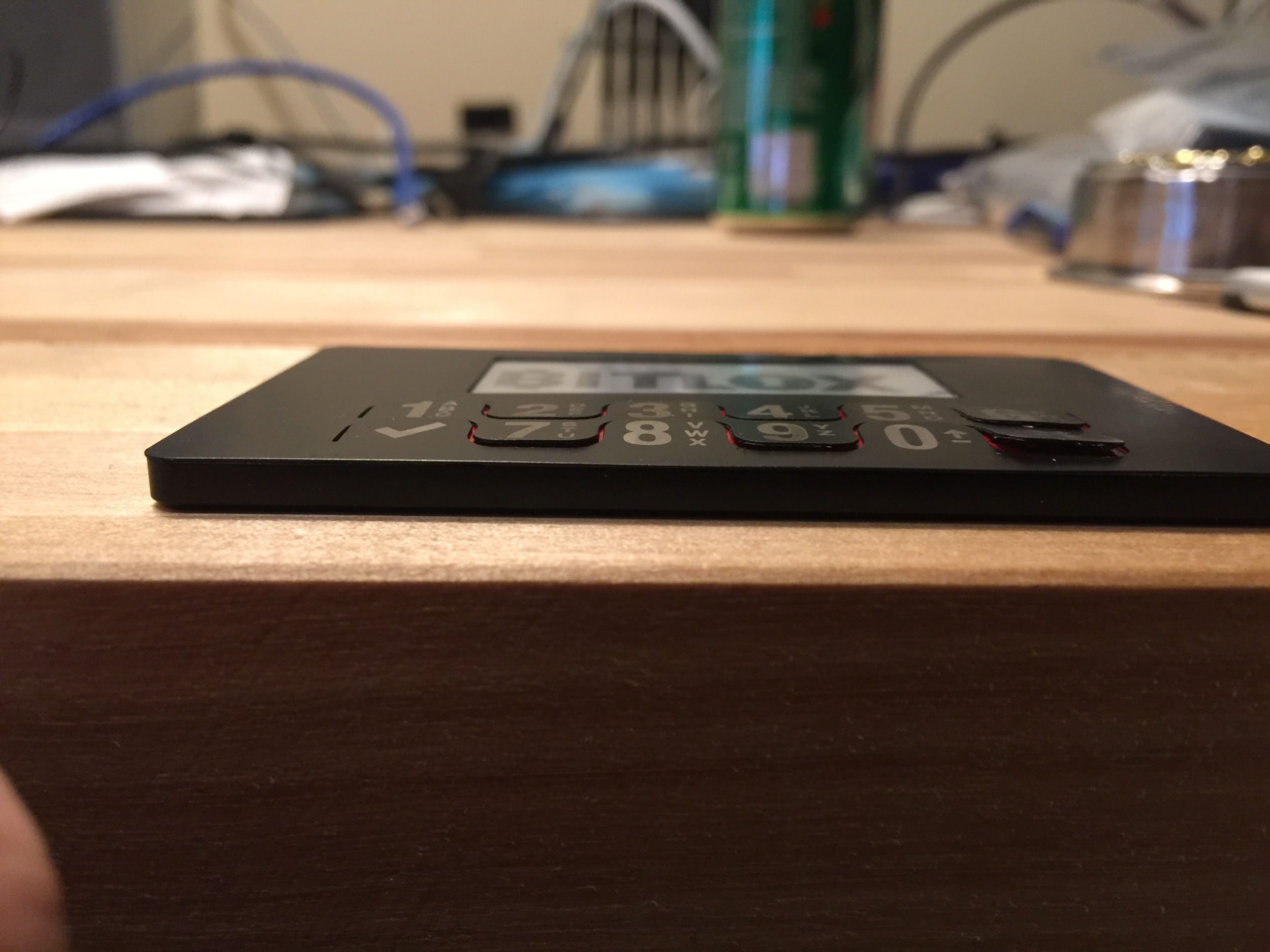 Its hard to capture how not flat the front surface of the Bitlox is. Also, look at those keys! They will catch on things in your pocket and bend out of position quite easily. I drink Mt. Dew.