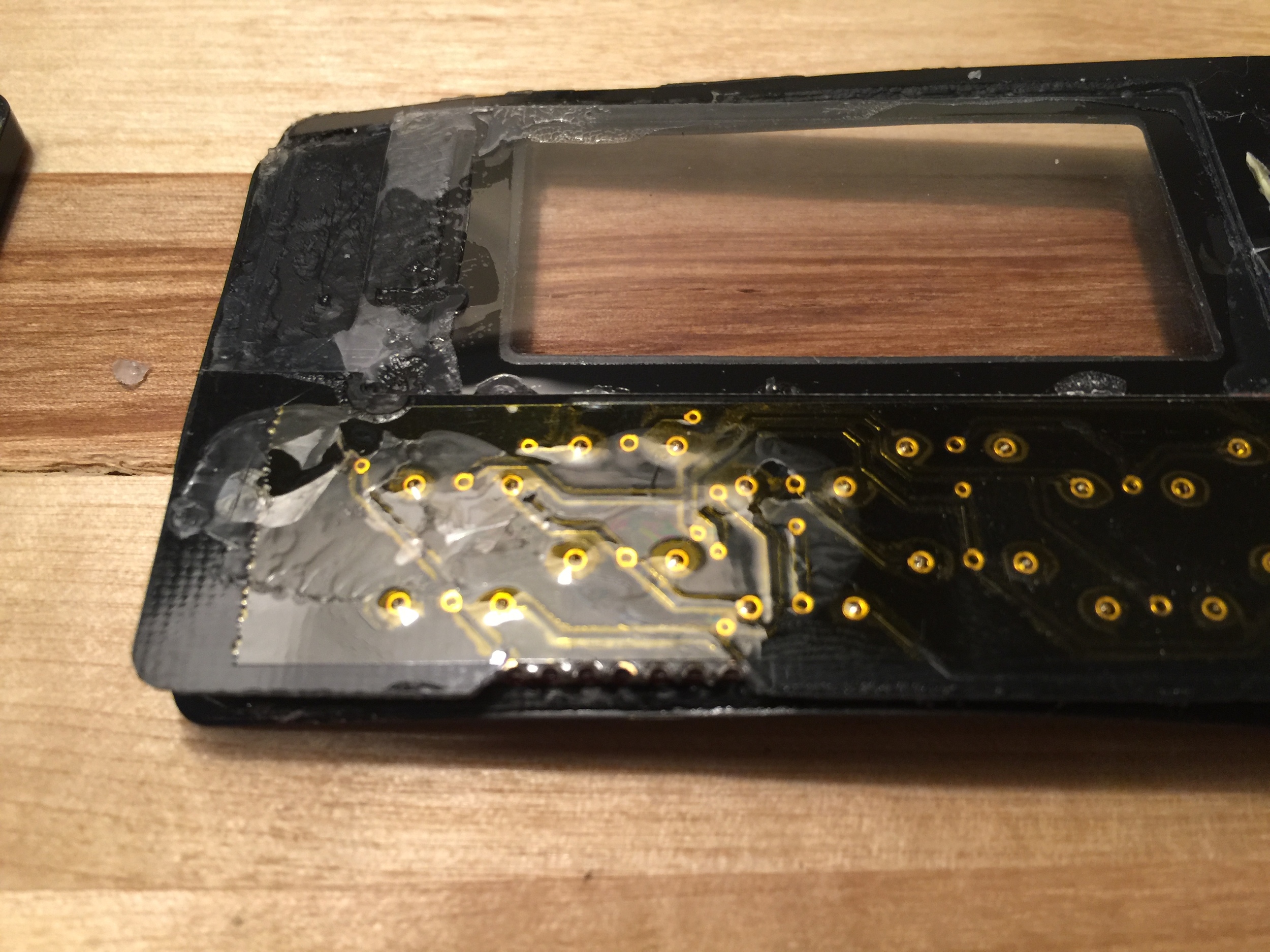 The back of the keyboard along with soldered edge connection
