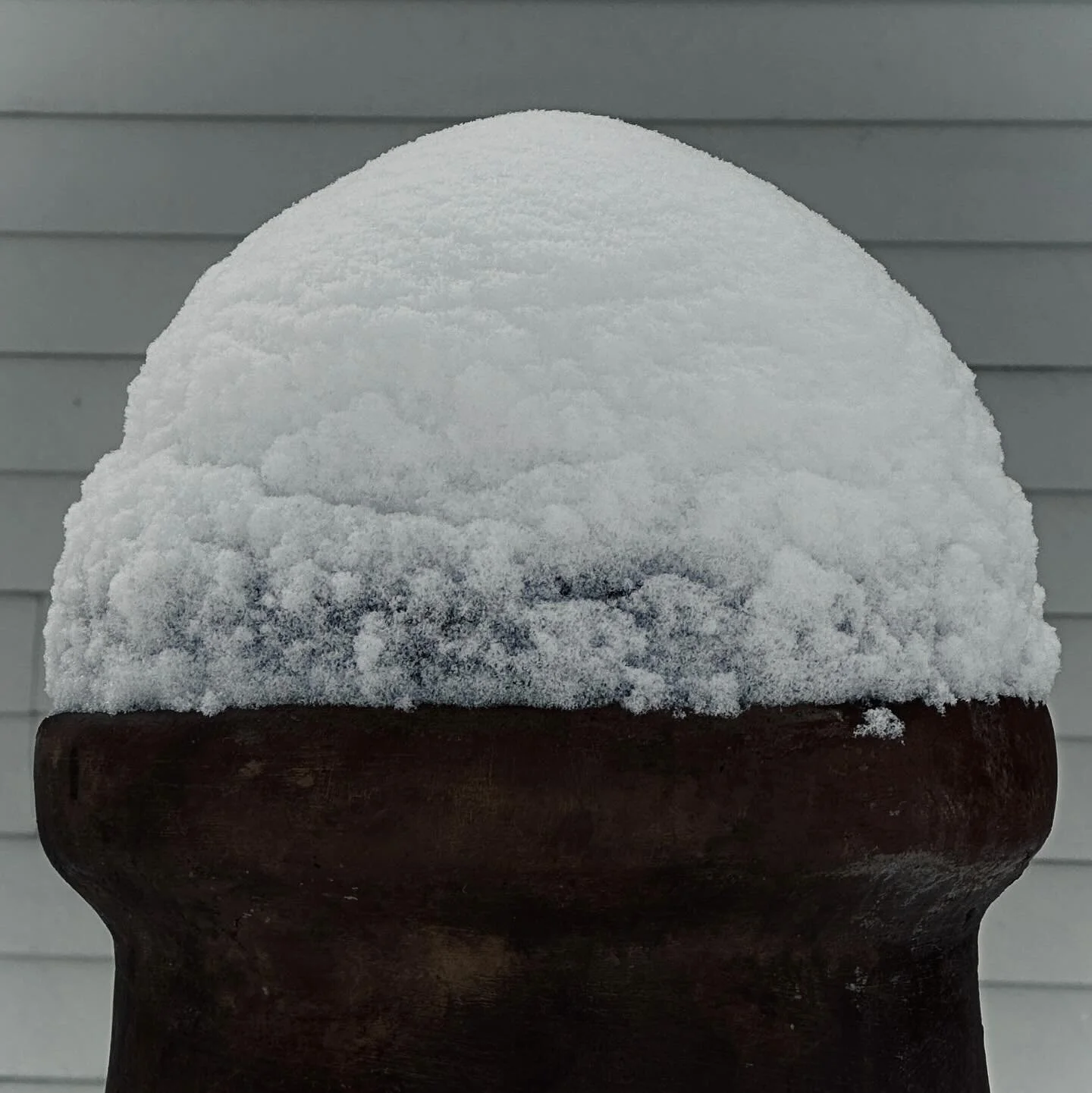 I call this snow cap on a chimenea . Last one of the snow day photos.