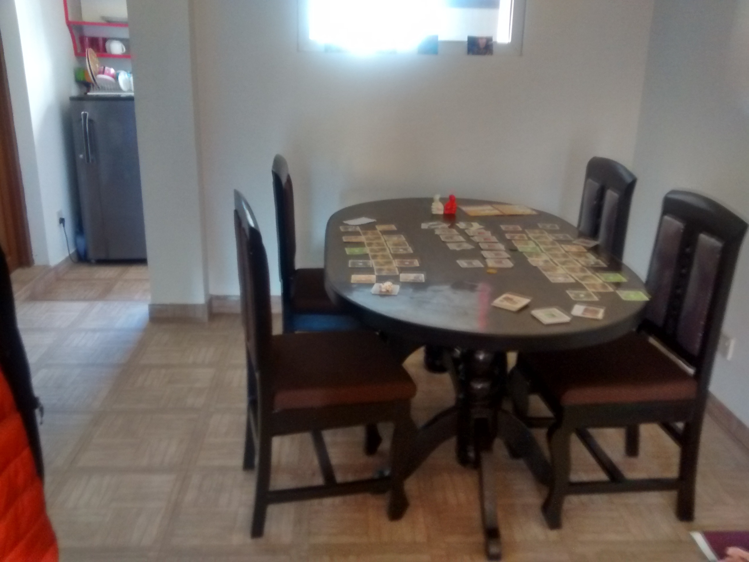 This is the dining room which opens to the living room behind me in this photo (I love the big open space). Again, pre-built tables are very expensive. When our landlord, Dipendra, found out we were looking for a table, he started hunting and took Benj to a place to have this one made for a really great price. 
