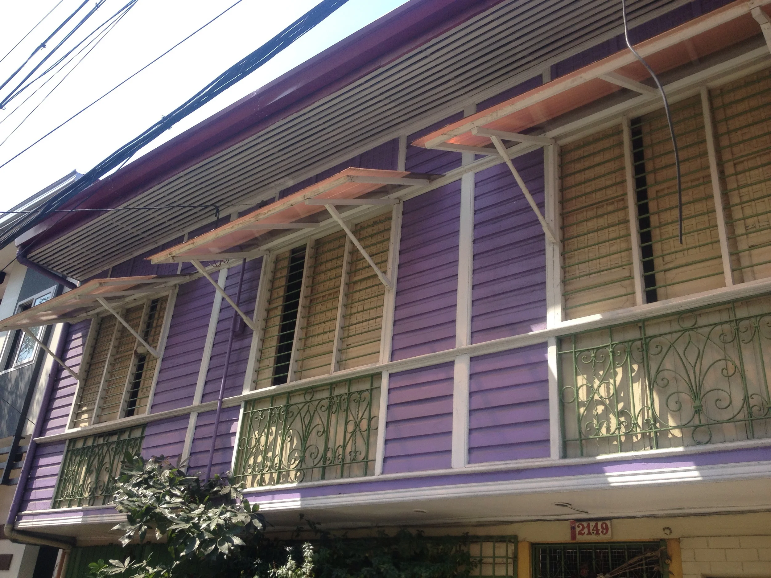 Adjustable window shades are found on heritage homes such as this one in Navotas.