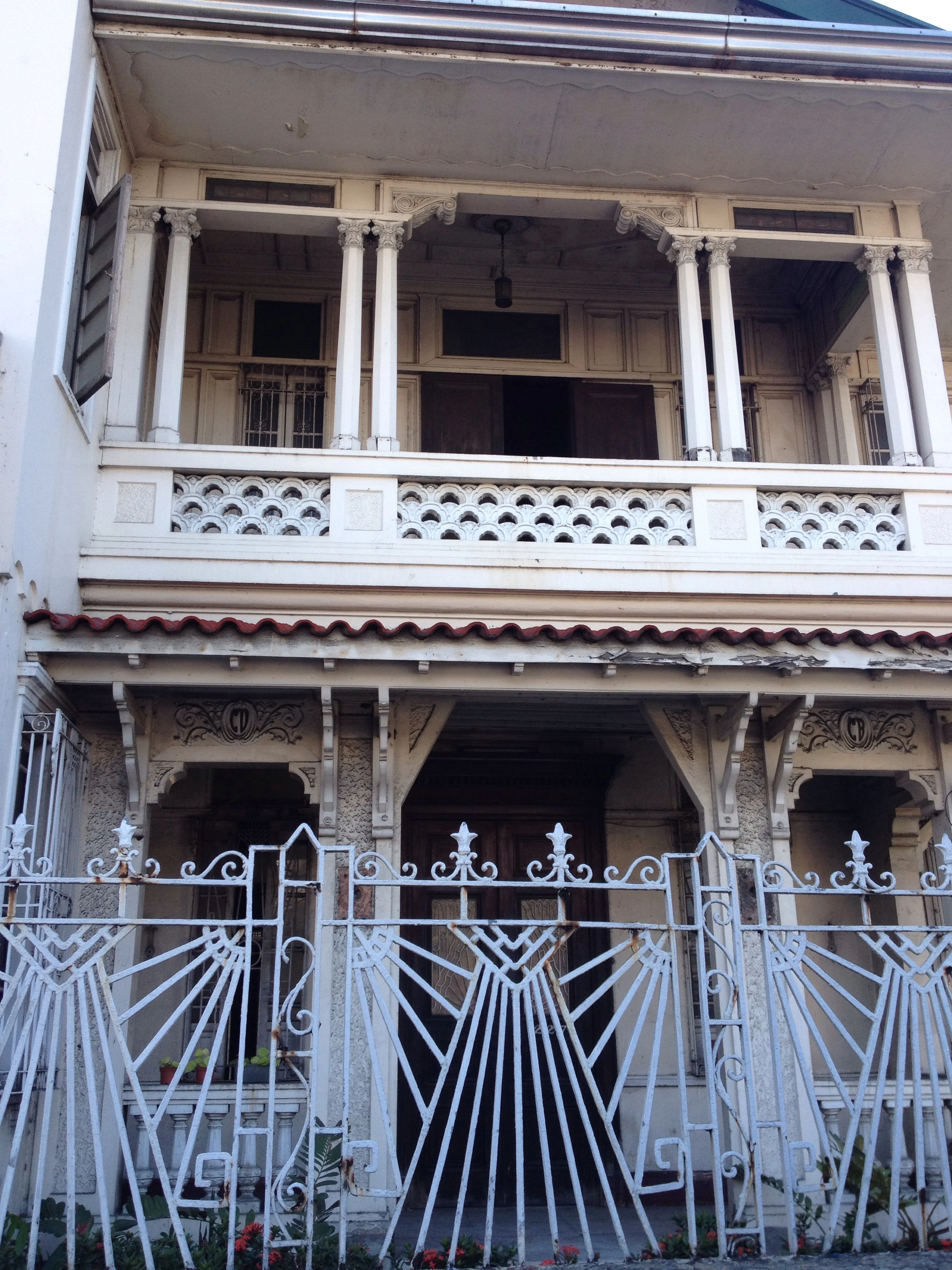 The iron work! The balcony! The wood details! Who's house is this and can you please open it to the public?! 