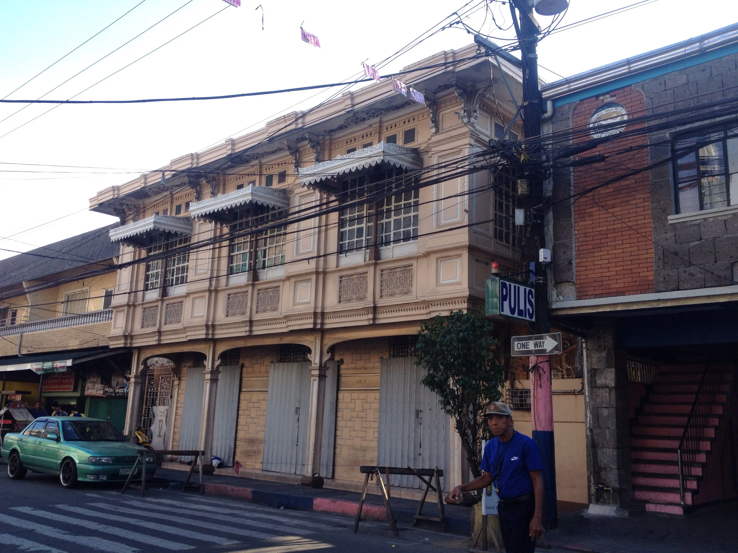 Another heritage home on General Luna St. This one seems to be well preserved. I will have to come back to see what stores are on the first floor. If tourism takes hold here the ground floor shops would make great souvenir shops since it is across the street from the Church of the Immaculate Conception. Next store is the Barangay hall and a basketball court. The two lane streets are already quite bikable, but the city could think about putting in bike racks in this area since there is a cluster of uses. 