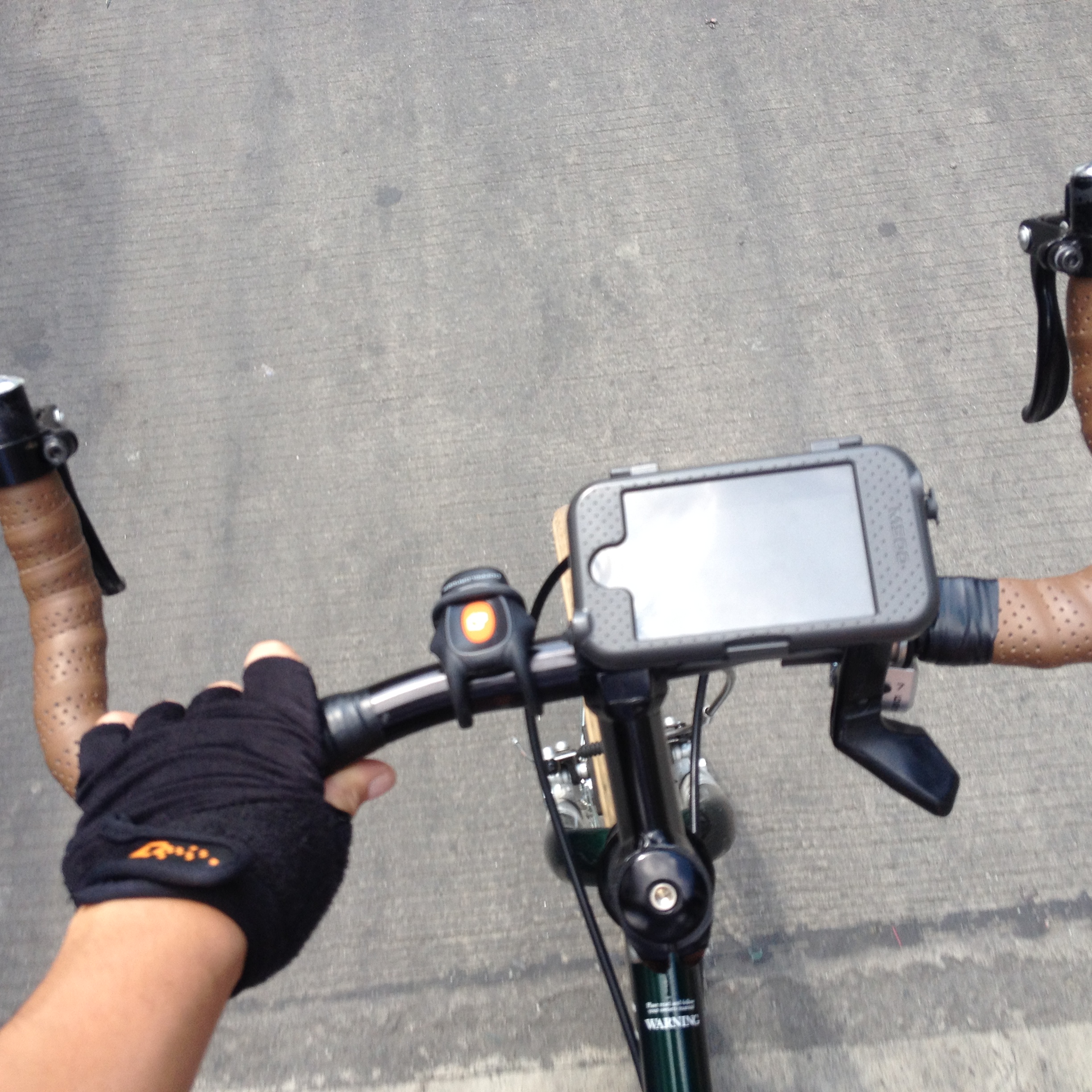 A few things that are making more journey more comfortable: Doppleganger Hub PH gloves, a front light, and an iphone mount for navigating and easy access to the phone for taking pictures. 