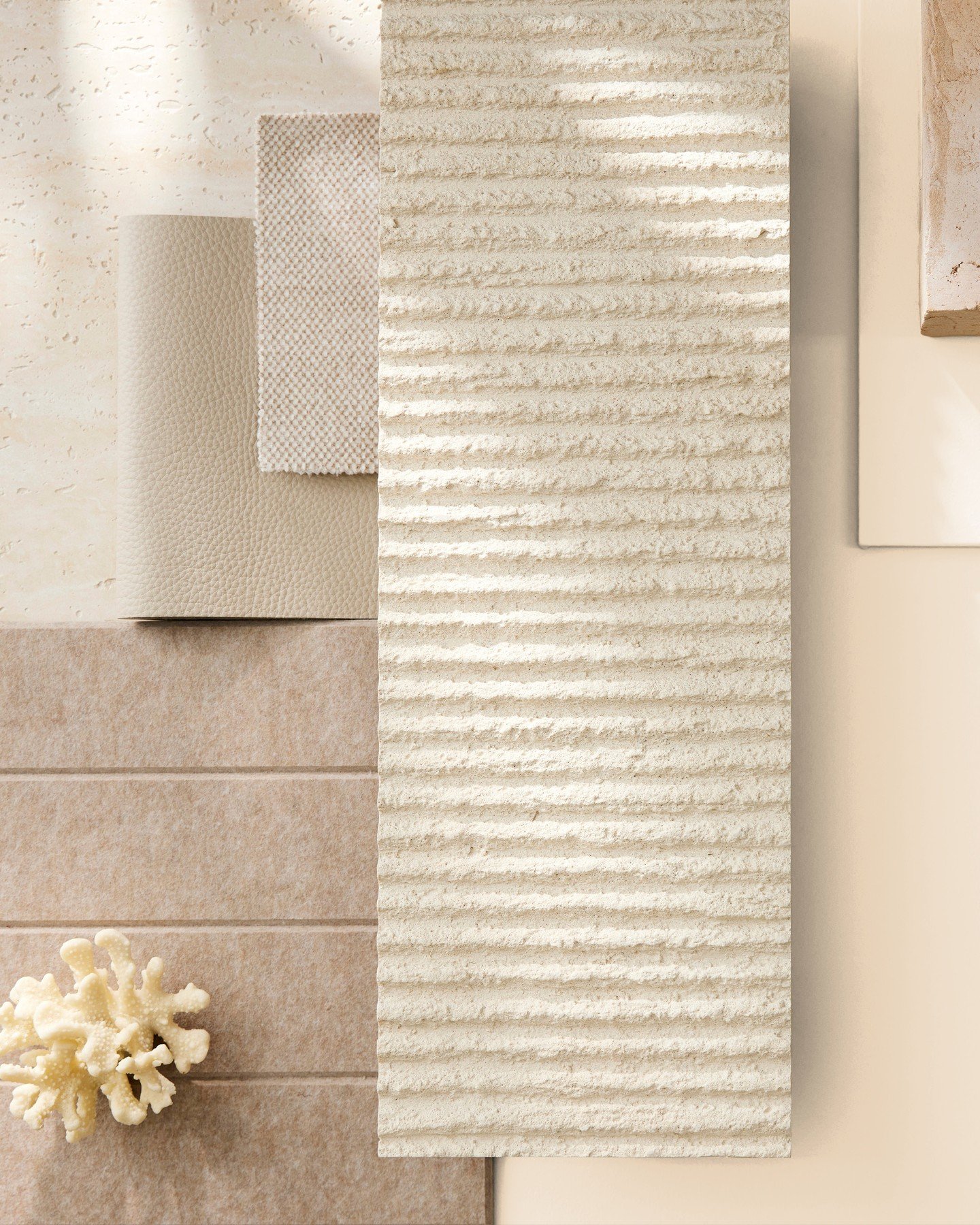 This mood board channels the calm and warmth of coastal minimalism through a palette of soft neutrals and natural textures. Tactile ribbed stone takes center stage, paired with pebbled leather, sandy linen, matte travertine, and structured tile. The 