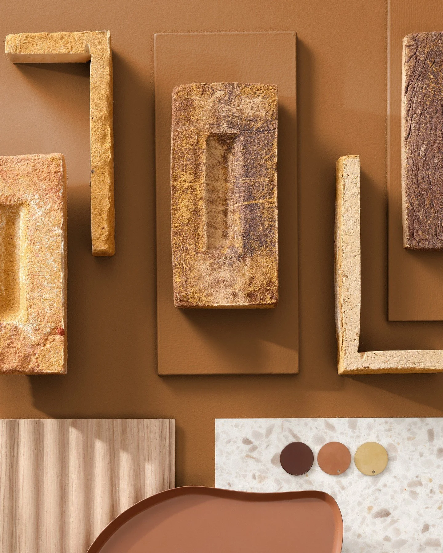A visual journey through layered creativity. This mood board captures a mix of materiality and tone&mdash;earthy bricks with raw textures, soft wood grains, warm leather hues, terrazzo surfaces, and matte metal finishes. Each board tells a tactile st