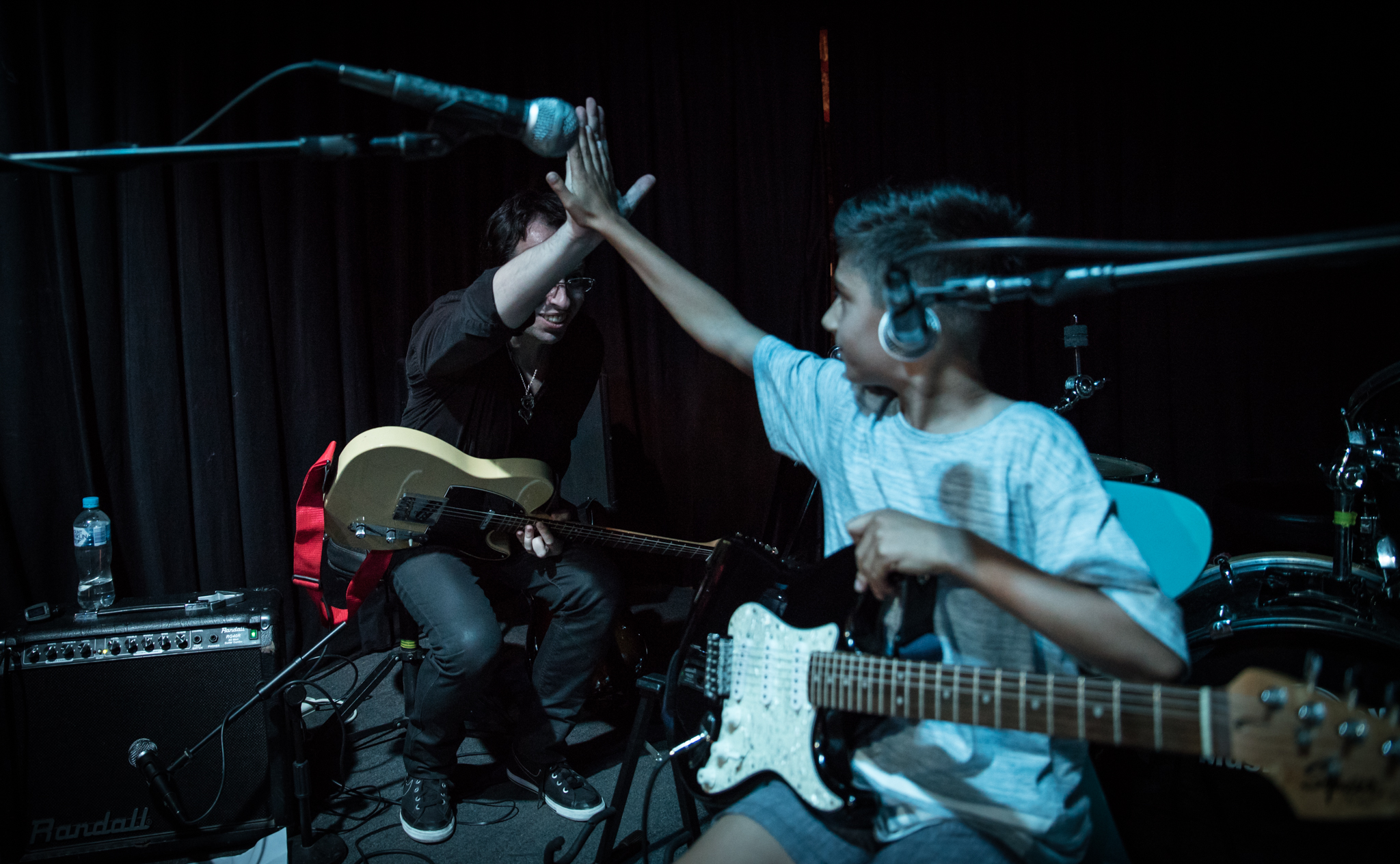 Our guitar teacher Fabio and student Josh celebrating a great performance of Castle On The Hill by Ed Sheeran