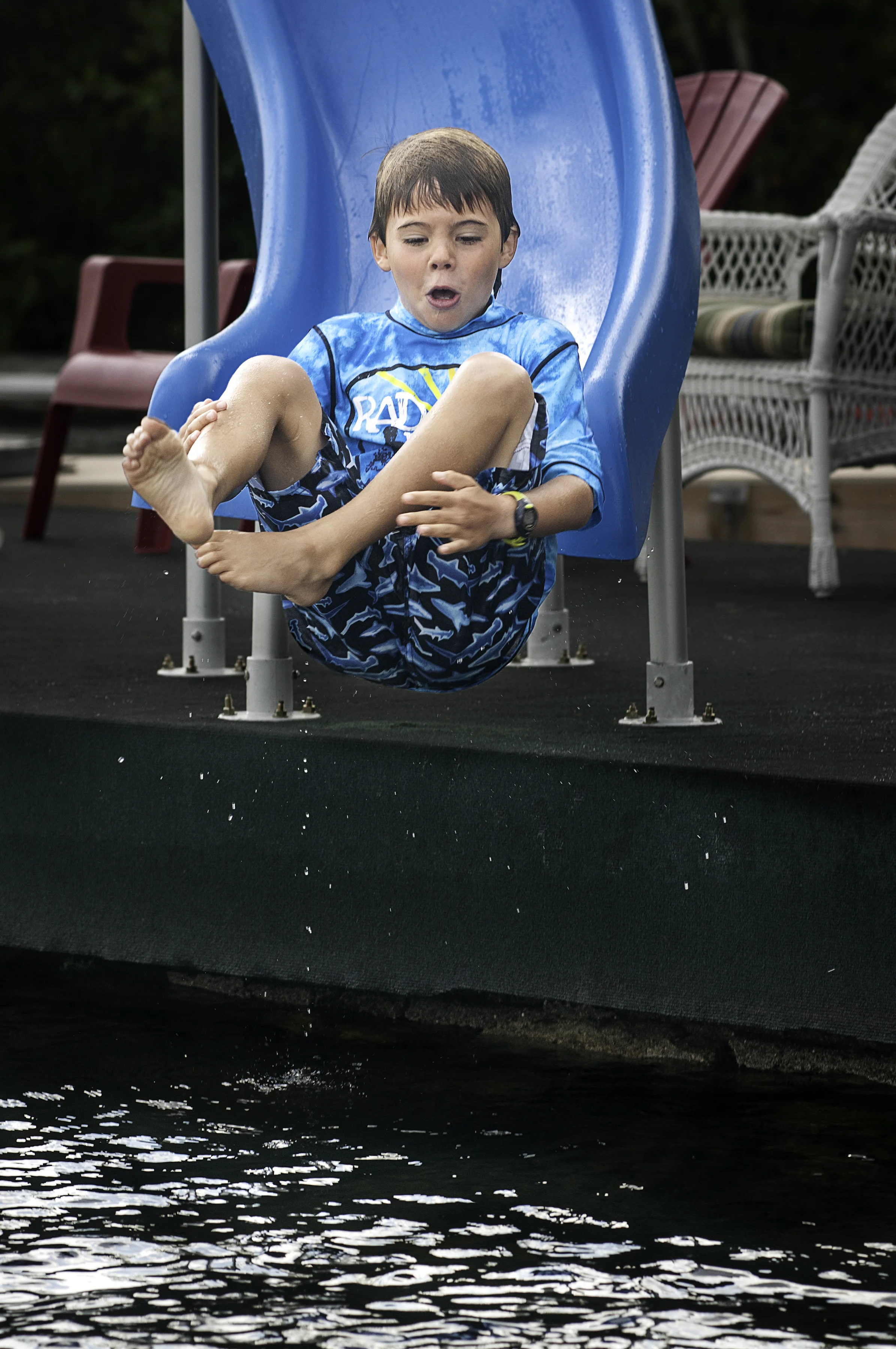 Photographed sliding at Lake Sunapee Yacht Club, Sunapee, New Hampshire