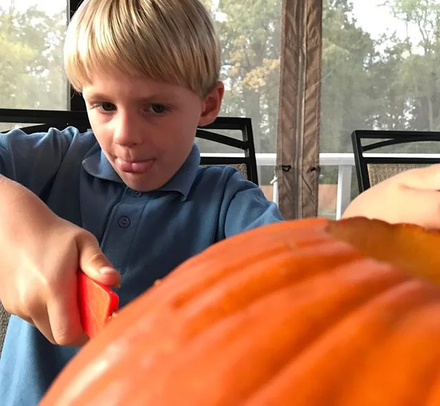 Fighting with the #pumpkin. Determined to get it carved. #Fall in #connecticut. #halloween