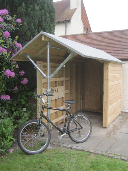 Bike shed - with unique sliding system + storage within the shed