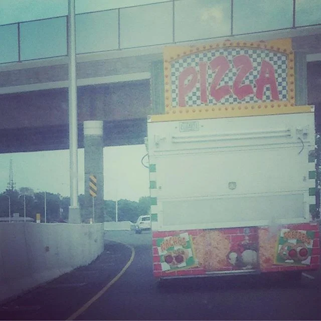 This is pizza on a truck.