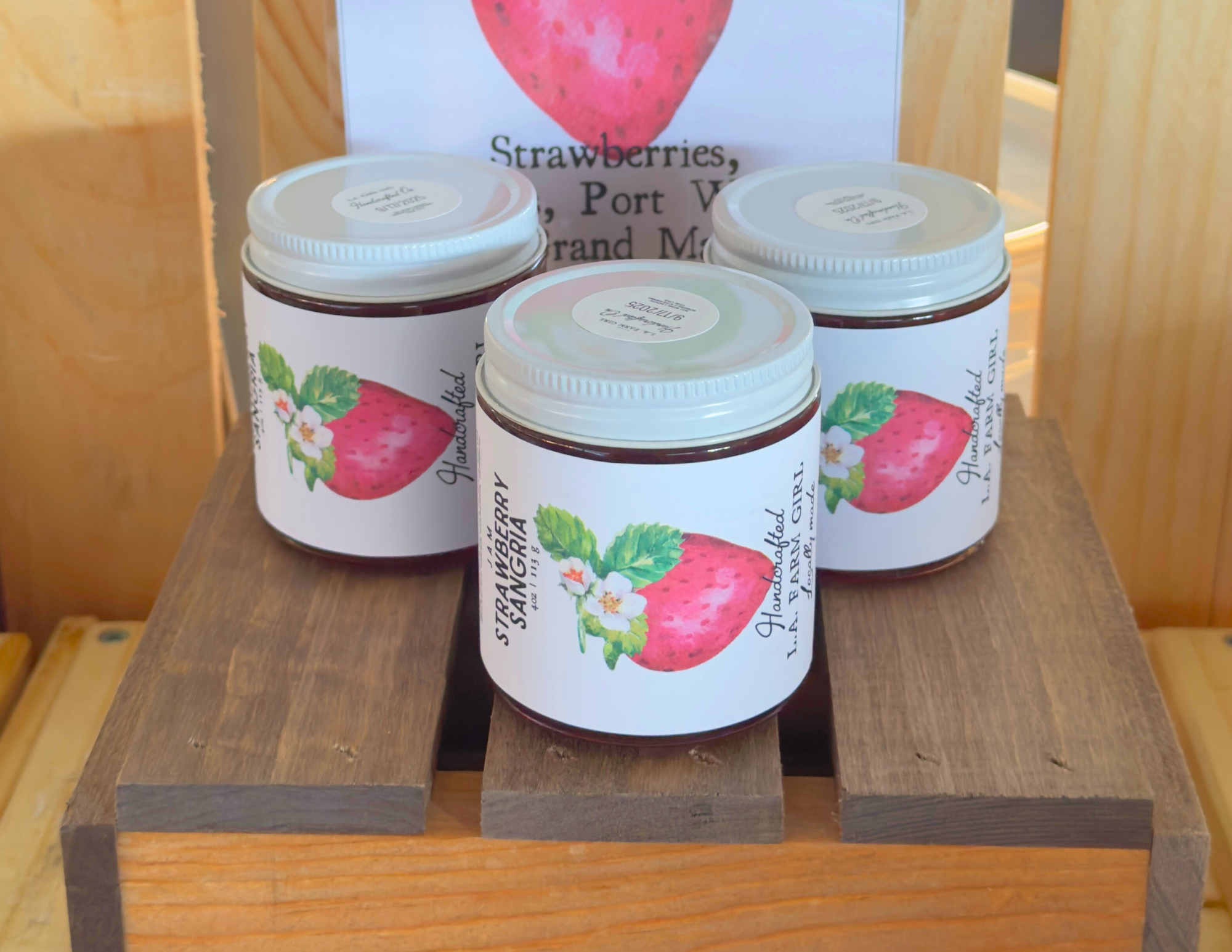 ss2.pngStrawberry Sangria jam jar styled on wooden shelf.
