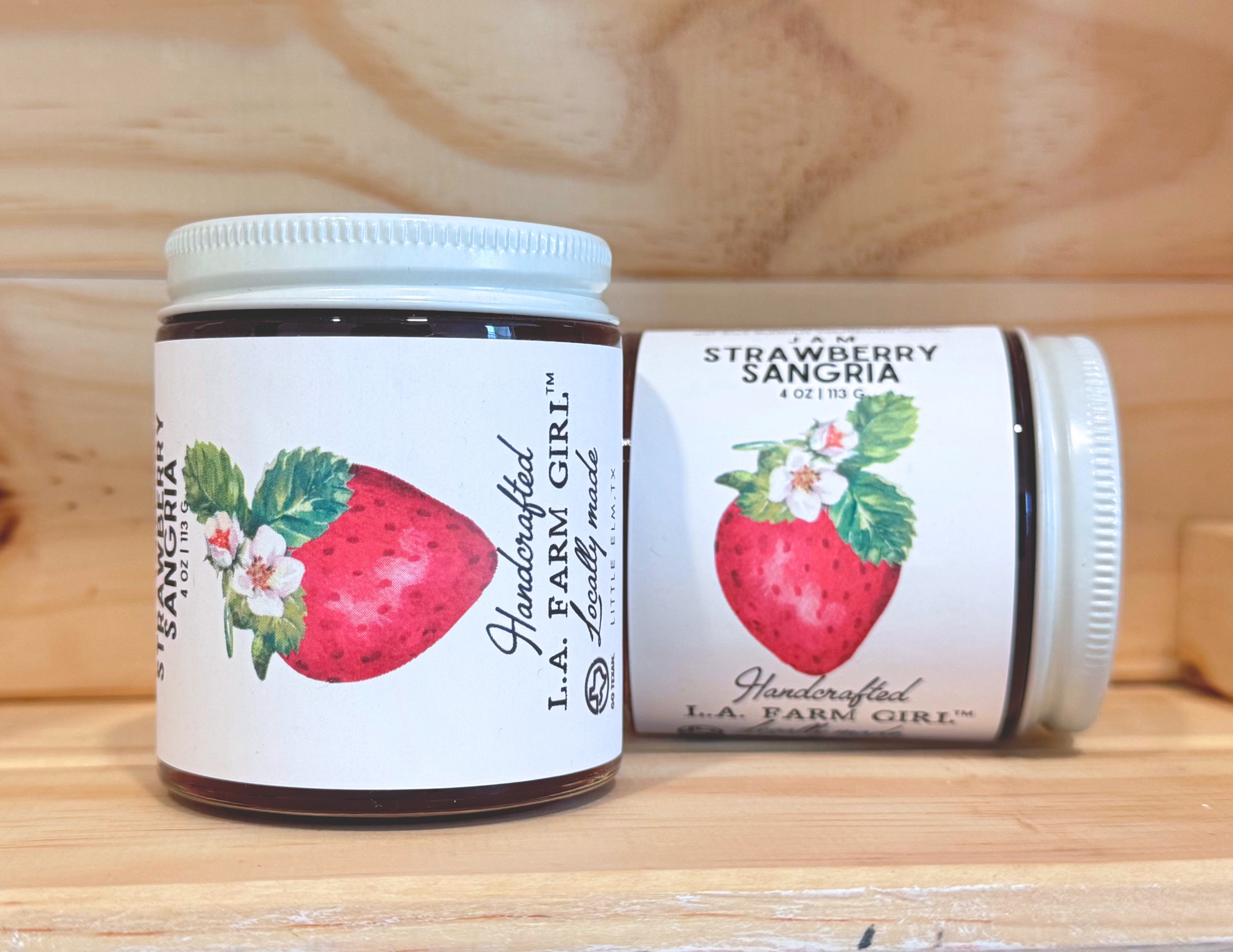 Strawberry Sangria Jam small-batch Texas jam jars side by side.
