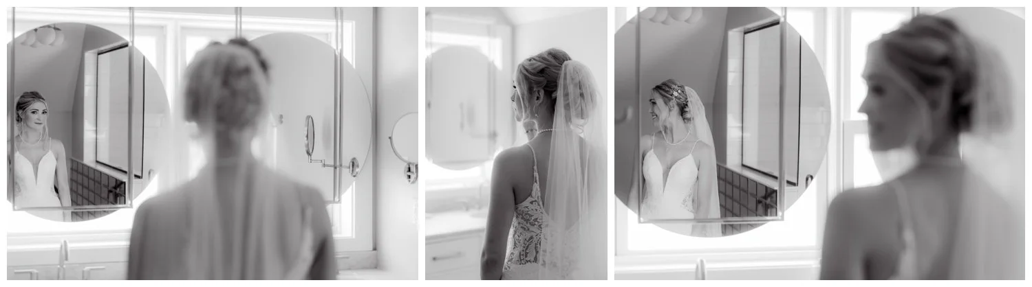 Black and white artistic imagery of the bride getting ready on ther wedidng day in a round mirror reflection.