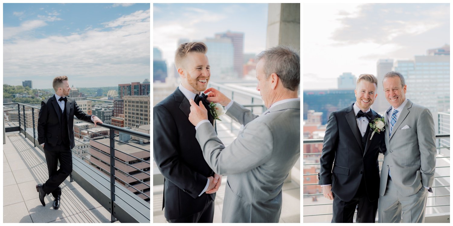 Groom Looking Out Over Cincinnati, Ohio City Skyline on Wedding day