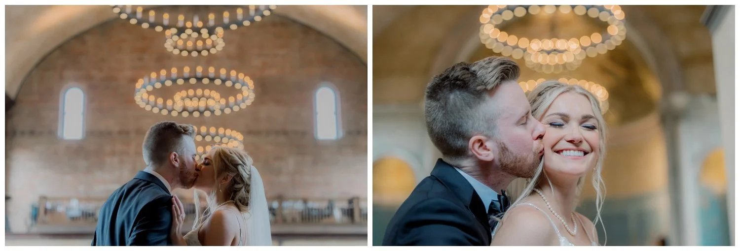 Close ups of the bride and groom kissing under The Monastery's chandeliers.