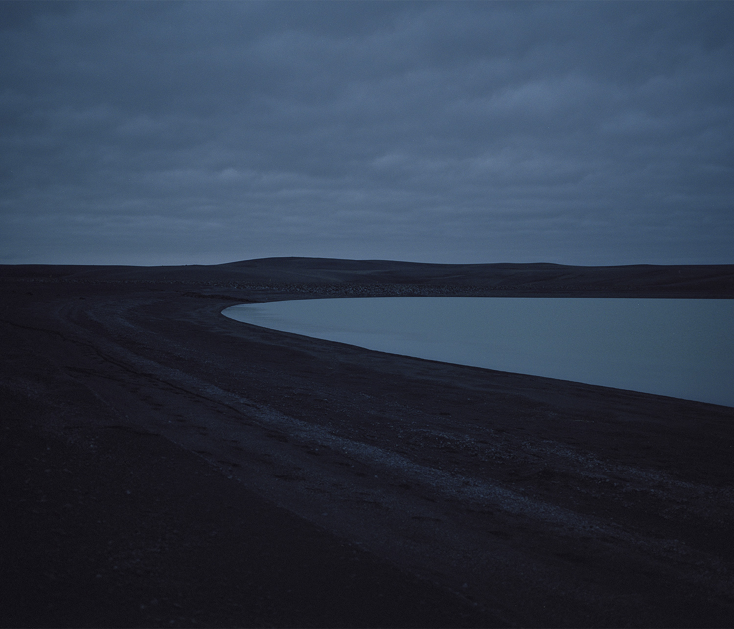 Glacial lake, black sands