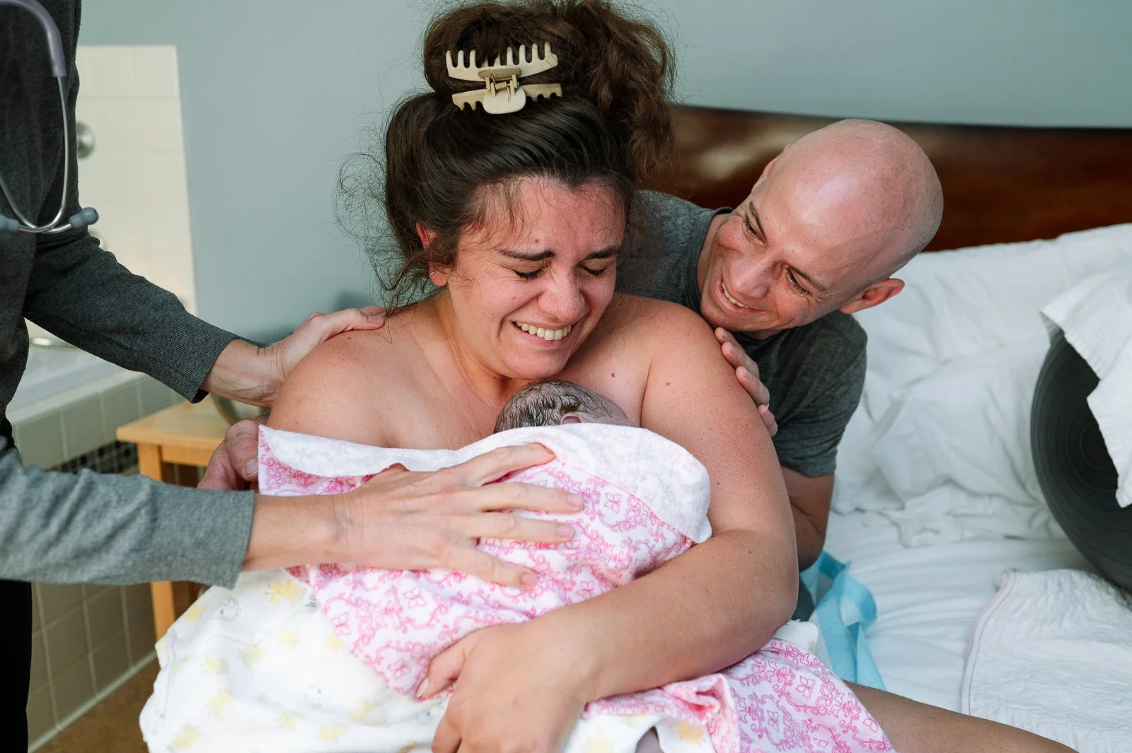 Dad and Mom Full of Joy and Relief After Baby Born at Birth Center