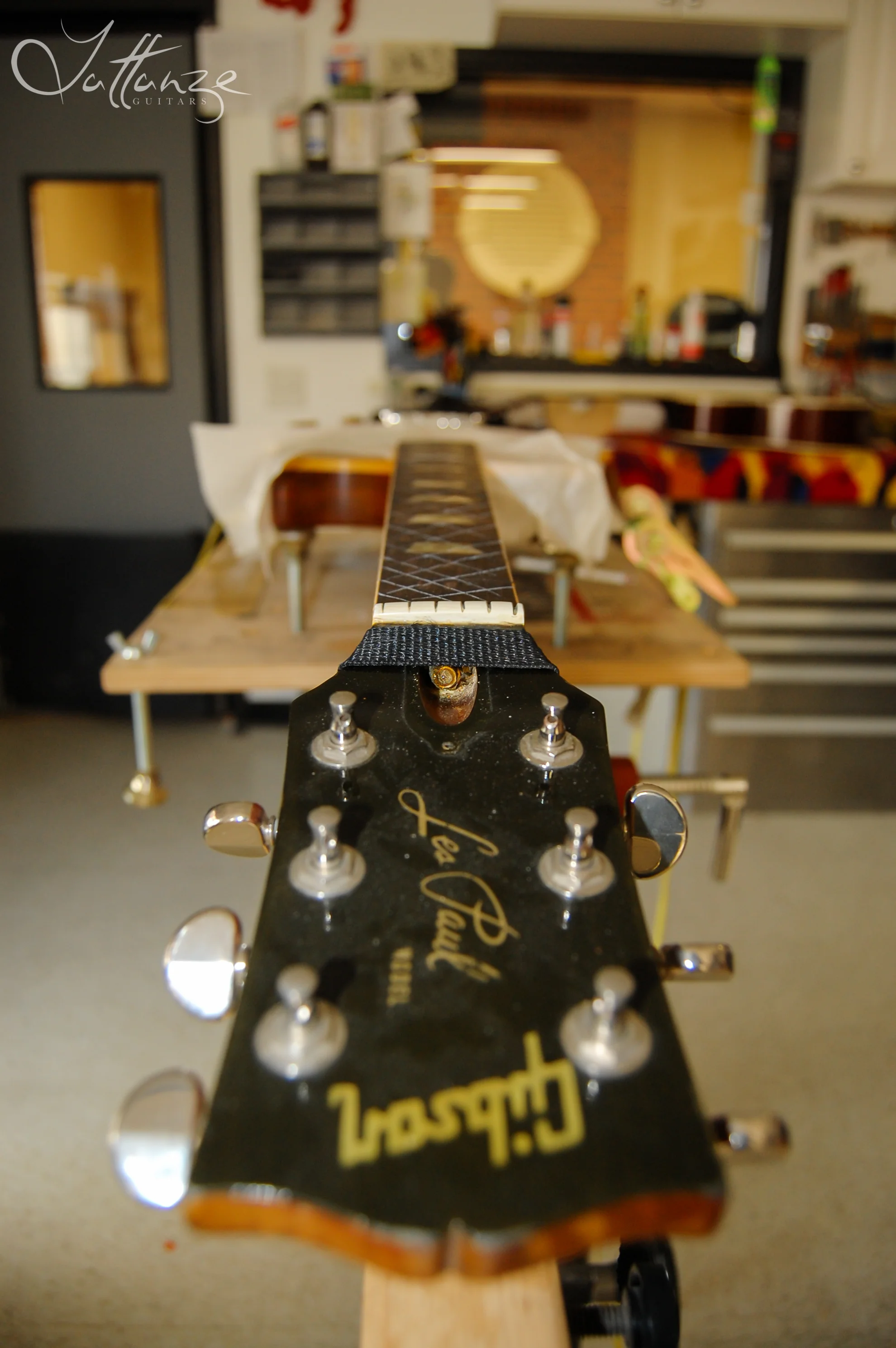 SIGHTING DOWN THE NECK JIG BEFORE LEVELING THE FRETBOARD