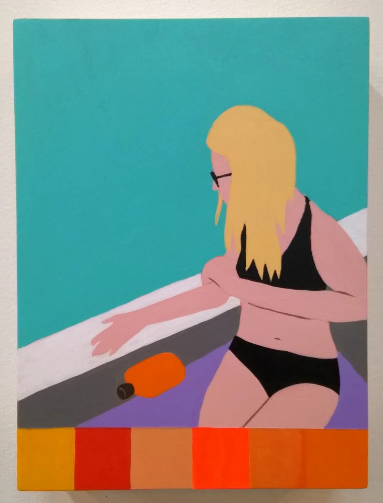 Woman Applying Suntan Lotion