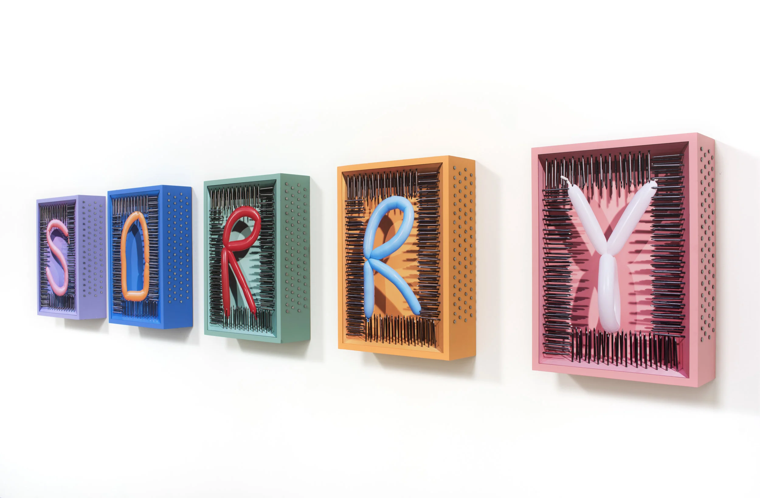 The Last Apology (side view), 2019 Five archival pigment prints, wood, acrylic paint, and steel nails 22 1/2 x 16 1/2 x 5 1/2 inches