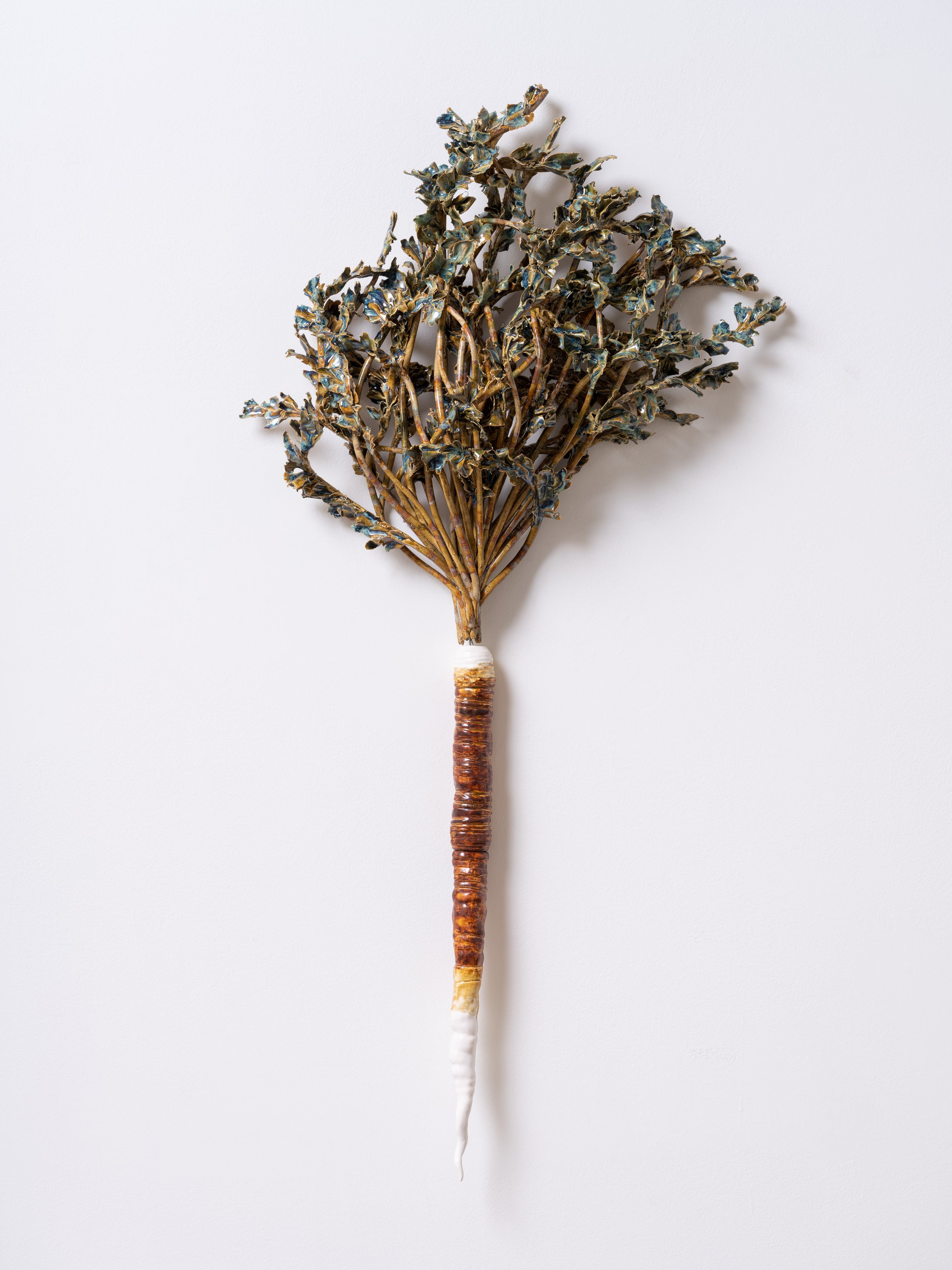   Carrot with Stem , 2022  Glazed stoneware and porcelain  50 x 24 x 8 inches (127 x 61 x 20.3 cm)&nbsp; 