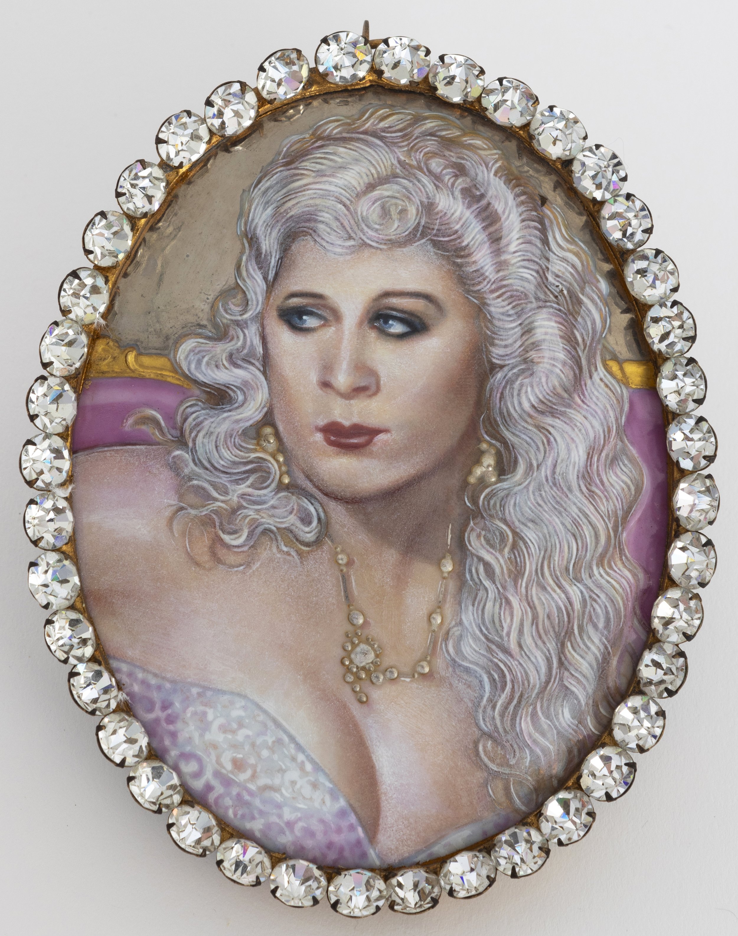   Mae West , 1987 Enamel on porcelain, rhinestone encrusted frame 4 ¾ x 3 ¾ x ½ inches&nbsp; 