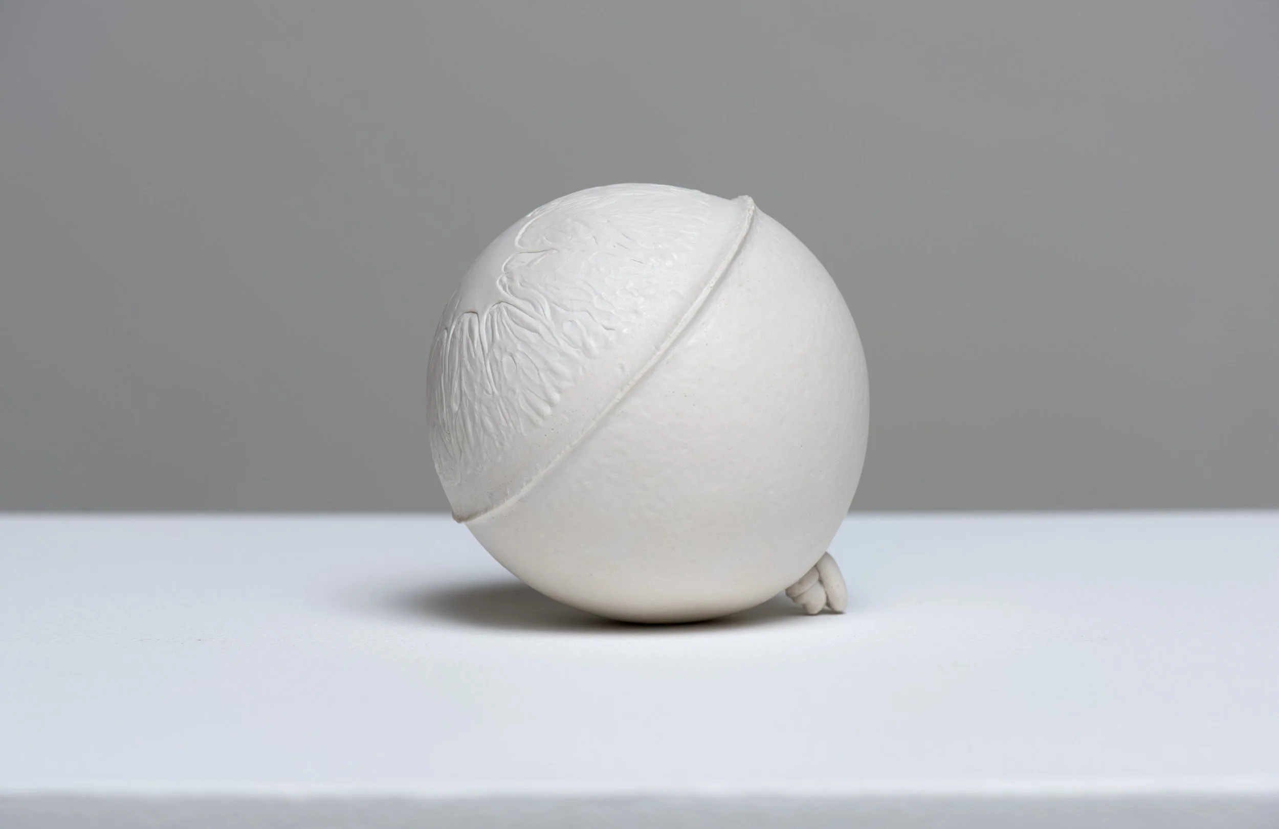  Navel , 2018 Gypsum and porcelain dust 3 1/2 inches (round) Edition of 5 + 2AP 