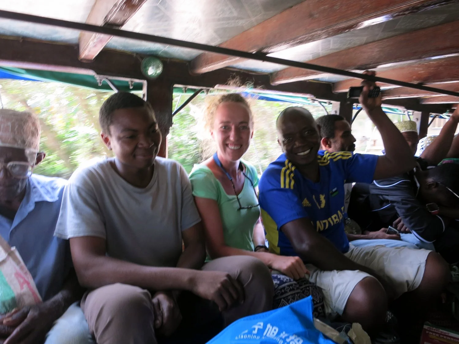  It was a VERY bumpy and long trip, and we kept picking up more and more people. &nbsp;At one point, we picked up a mother and her baby. &nbsp;The mother handed the baby to the first person she saw, then she climbed on board and to the very back of t