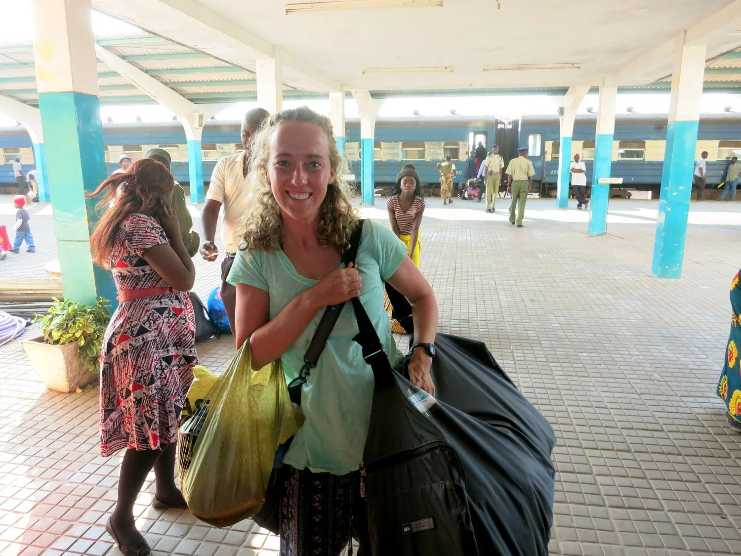  Before boarding, we knew it would be rough so we brought some provisions. &nbsp;And we sometimes covered our backpacks with grey duffel bags. &nbsp;Do you think we fit in? 