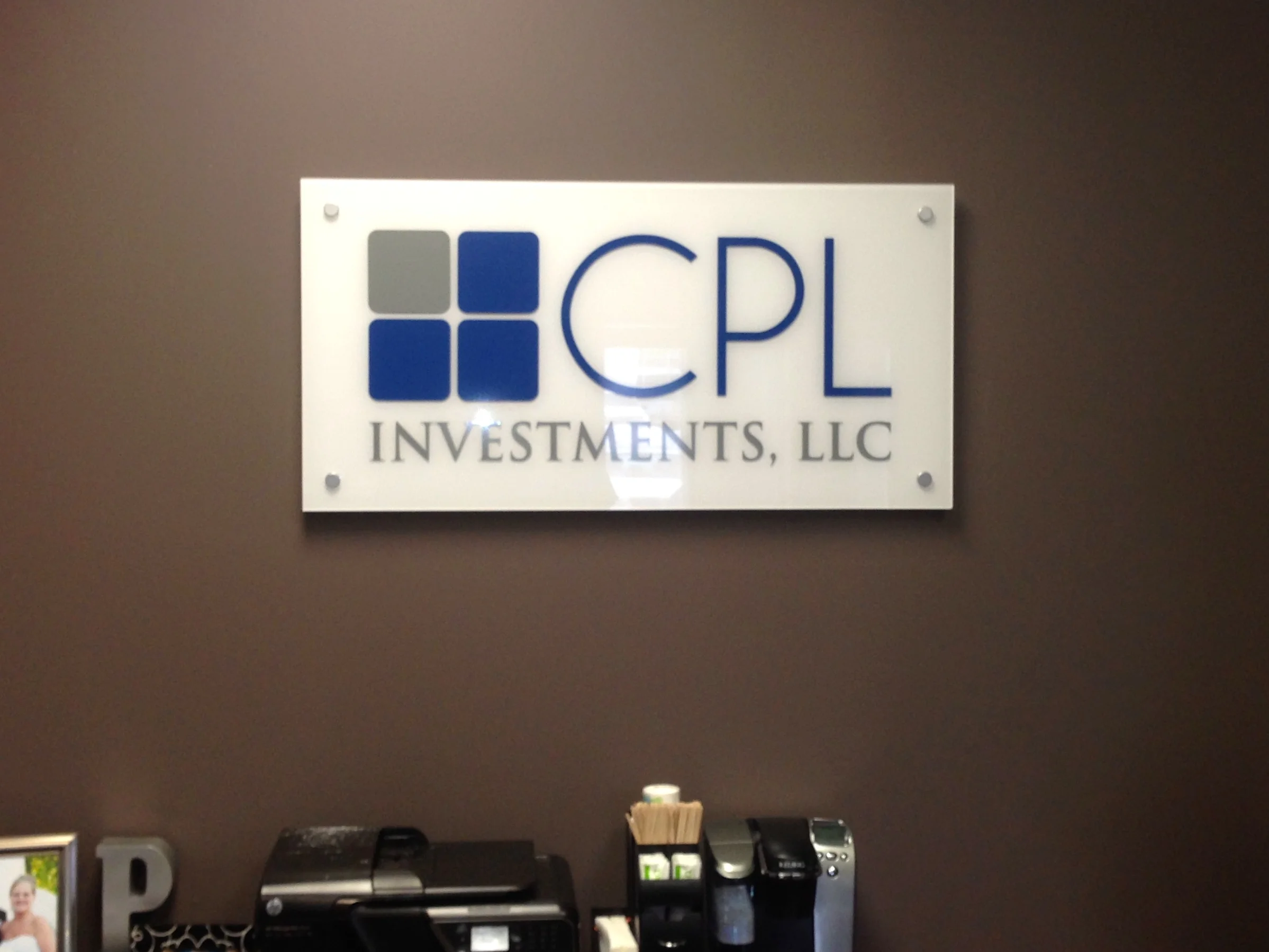 Interior Reception Wall Logo for CPL Investments, LLC