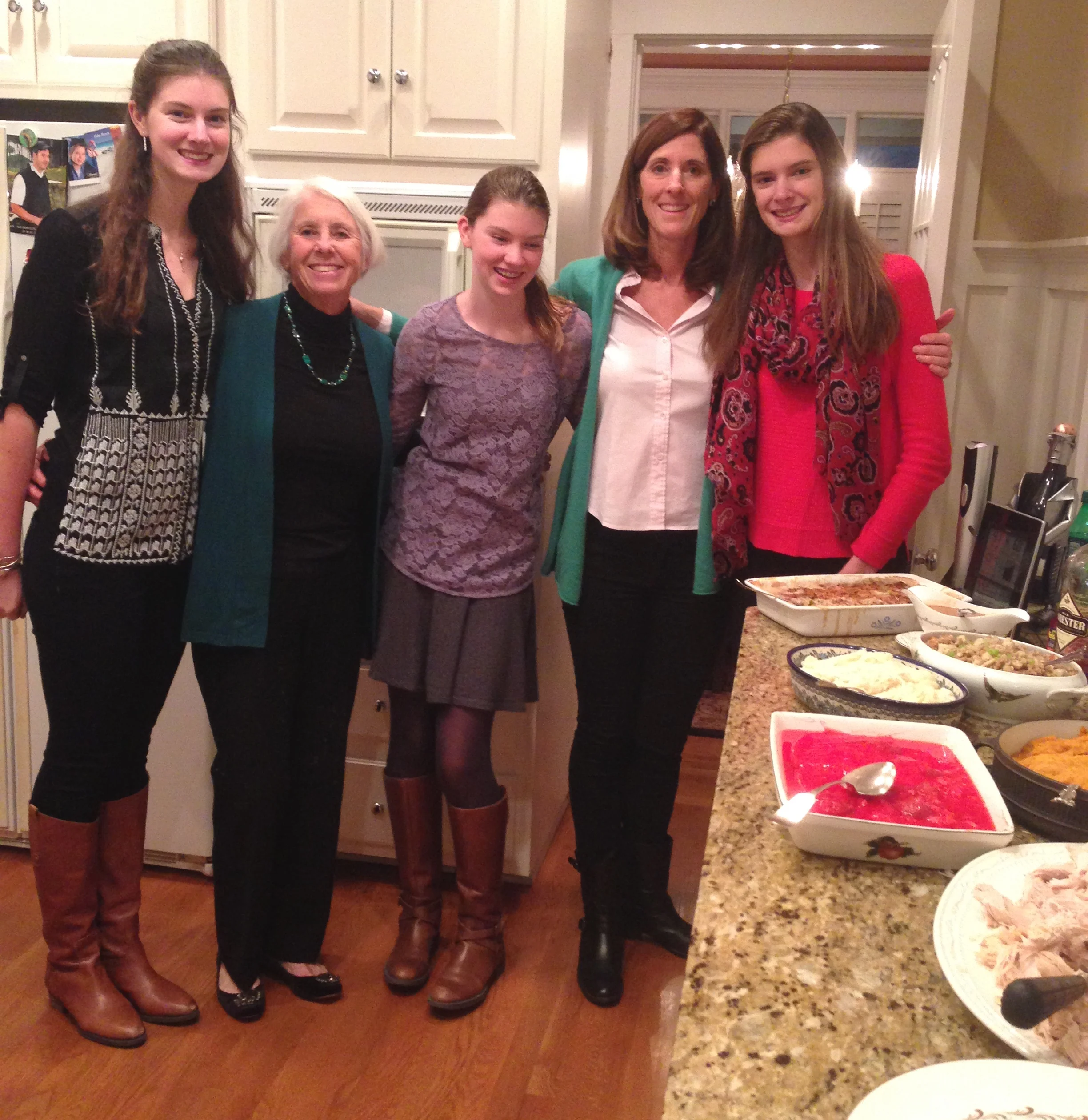Three generations of vintage cooks! Gail Becker, at home in the kitchen with her mother and three daughters.