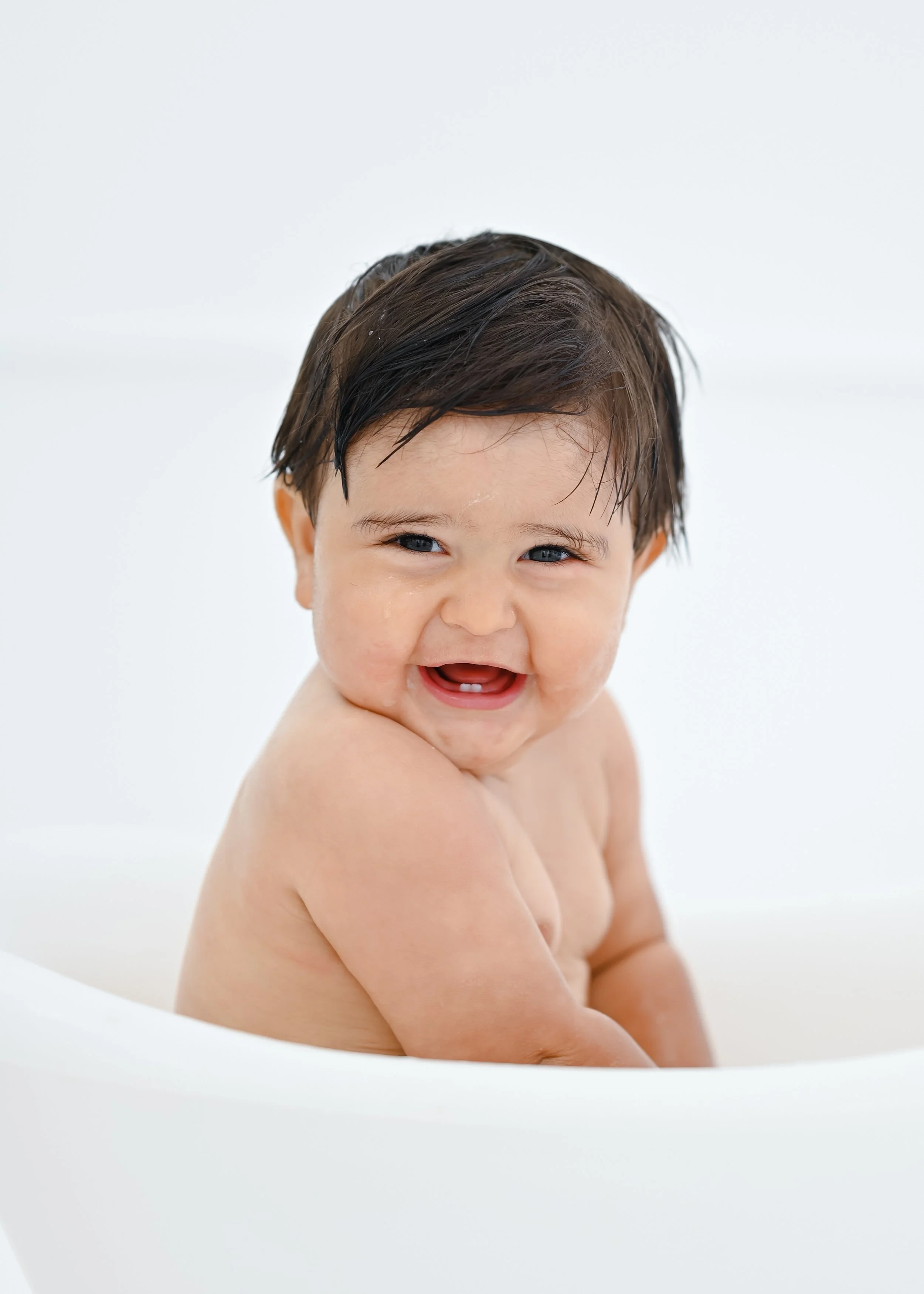 Cute baby in tub